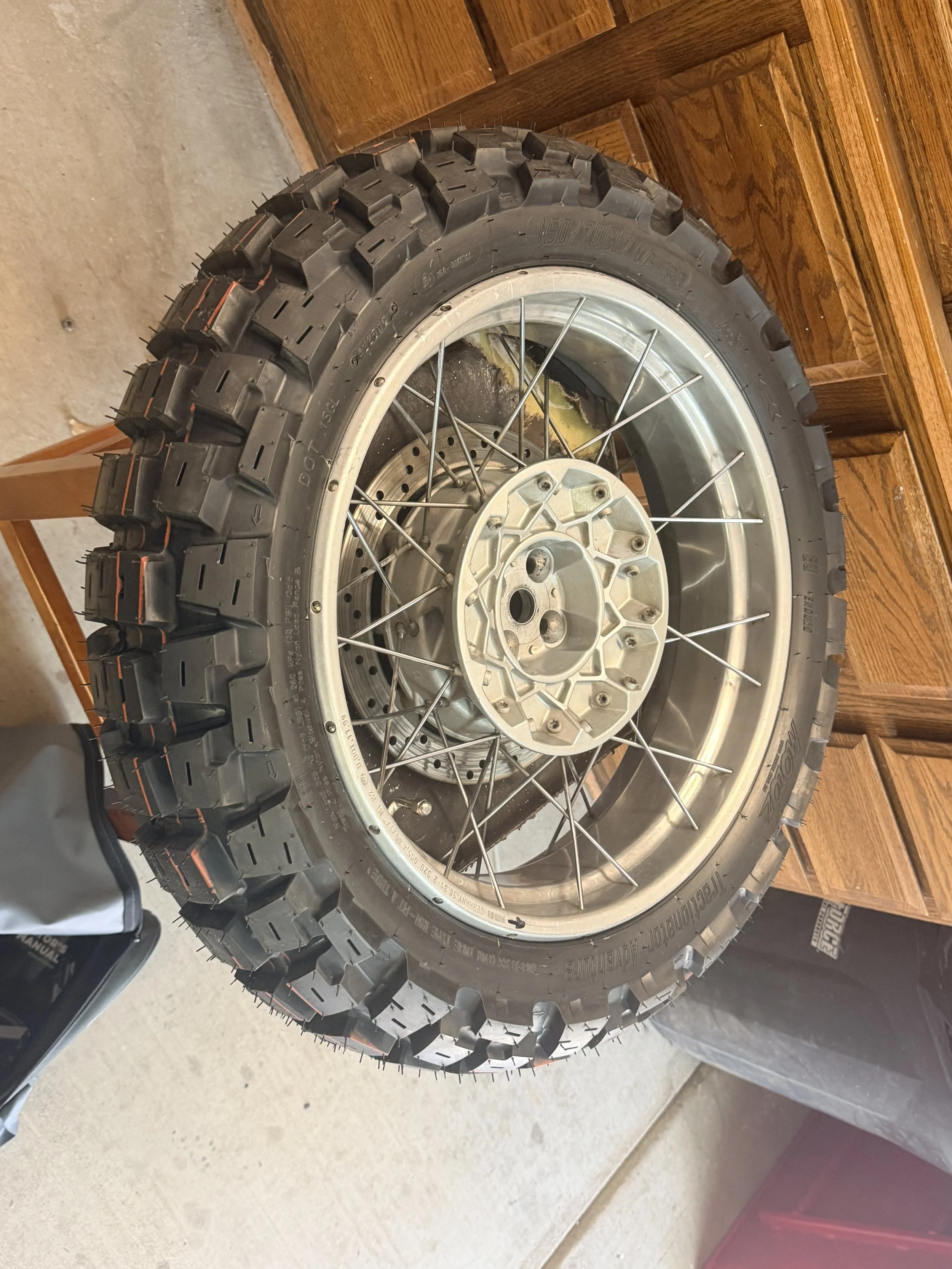 I wish I had taken better photos here. The entire rear wheel was full of water & sludge. It looked liked a bad valve stem, but who knows. When I took it off - I was so grateful it didn't implode during my test ride. 

Valve stem was replaced w/ a 90-