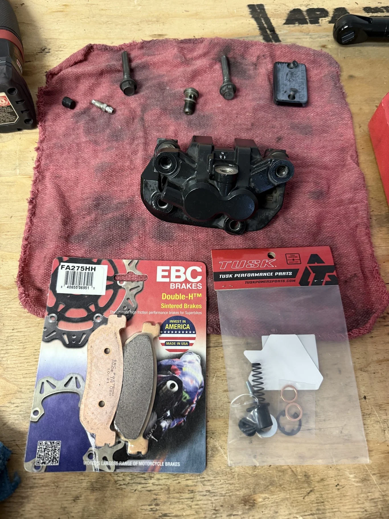 We got started with the brakes. For the front - a complete rebuild! Pulled the brake caliper, rebuilt it, added new brake pads. 