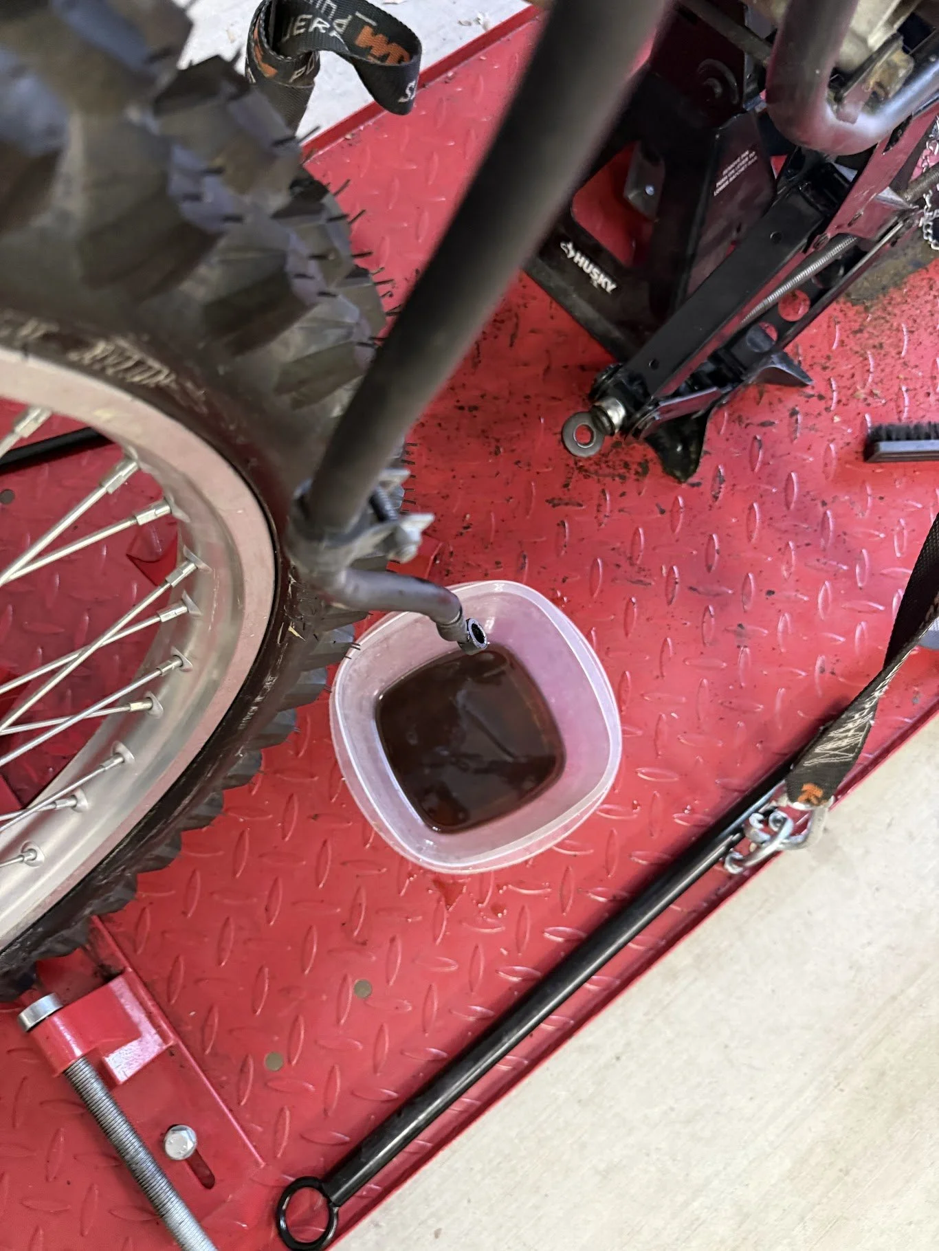 Inspecting the front brake line, it had to go. So we pulled it off and purchased a SS brake line, cheaper than OEM. 