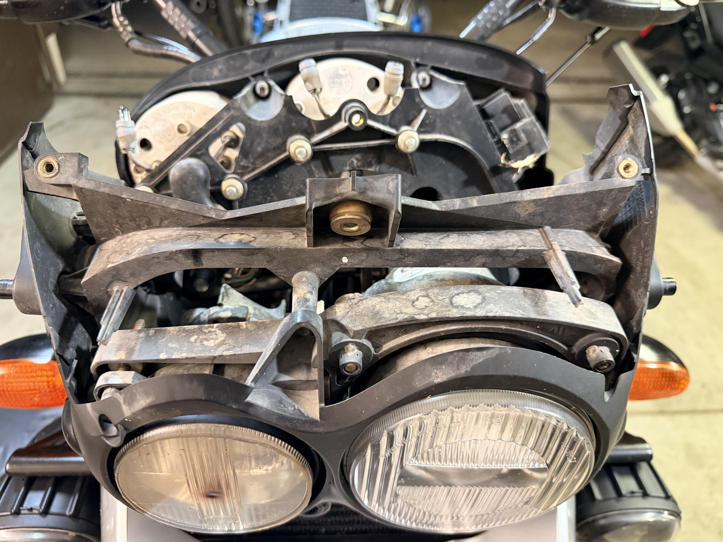 I had to dig into the headlight assembly to replace all the bulbs. I replaced them with standard bulbs easily replaced at parts store.  Headlights were replaced with H1 LED bulbs. The wiring in the headlight area was an absolute mess with multiple gr