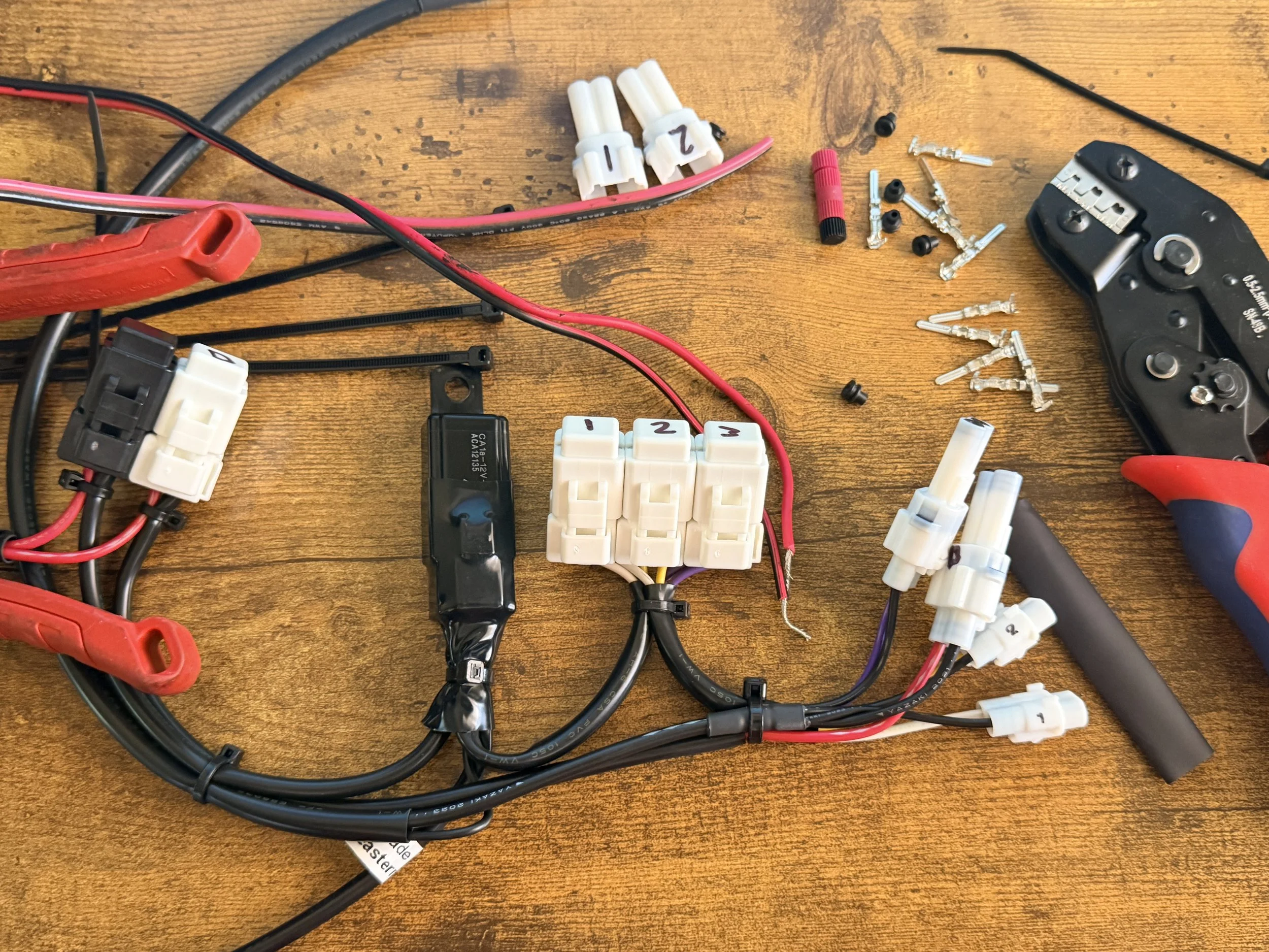 Eastern Beaver 4-Circuit system arrived, and we began to prep the harness for wiring & install. The previous system was working, but this solution is much more robust & better for the bike long-term. 