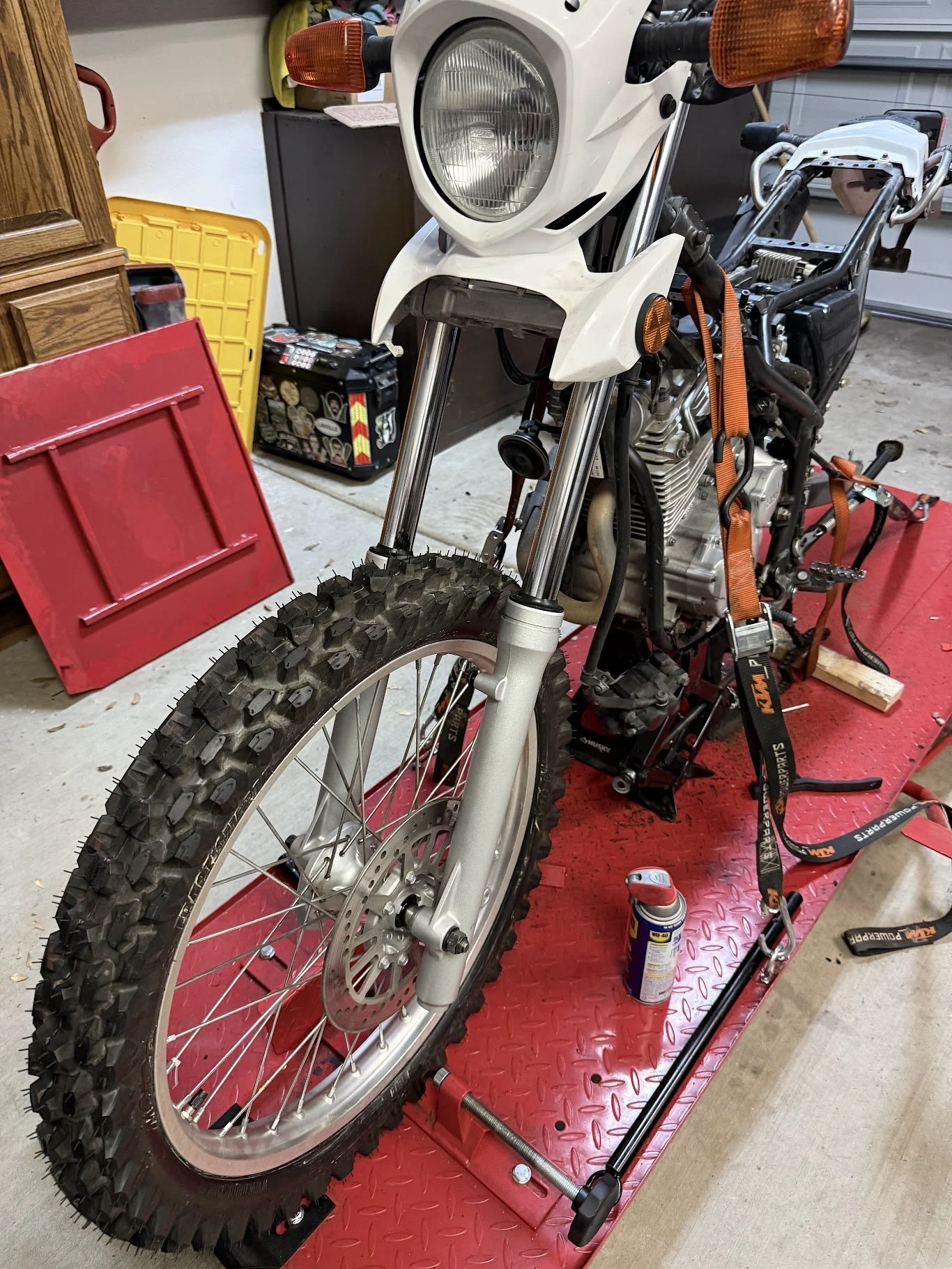 Got the front forks back on, torqued to spec, and the wheel re-installed. I decided to go with SealSavers - those will go on at a later date. 