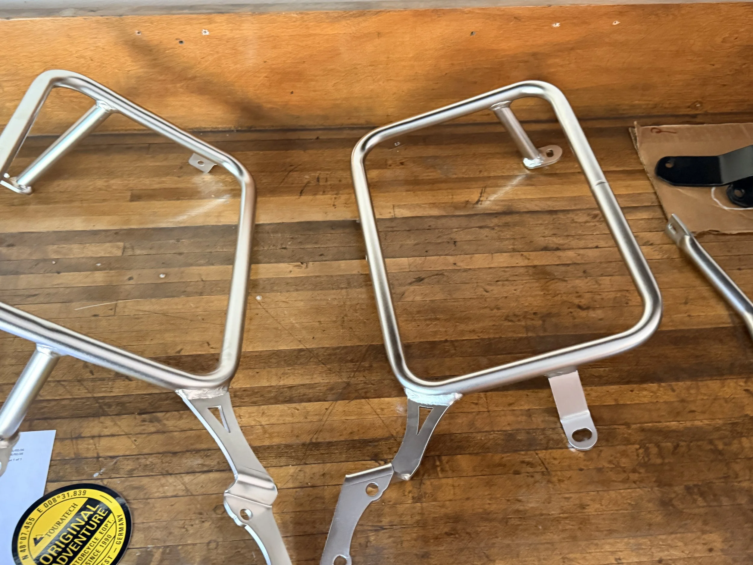An easy, early win - using the Mosko Moto luggage from my previous bike - just needed something to attach them to. The Touratech racks went on super easy. 