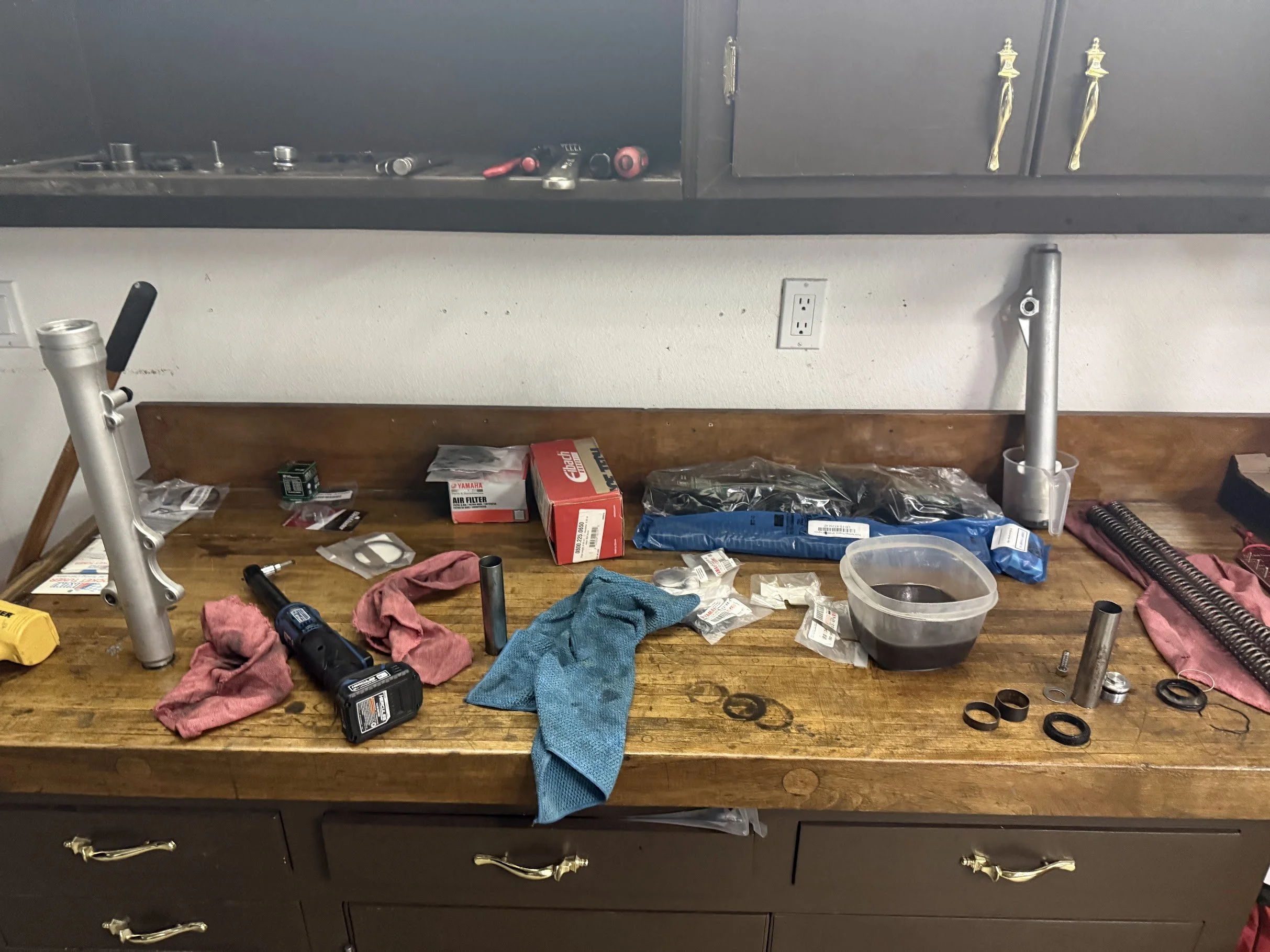 Tearing down the front forks became a problem when one of the bolts on the fork bottom was cross-threaded & wouldn't come out. Took a lot of creativity to get it out. 