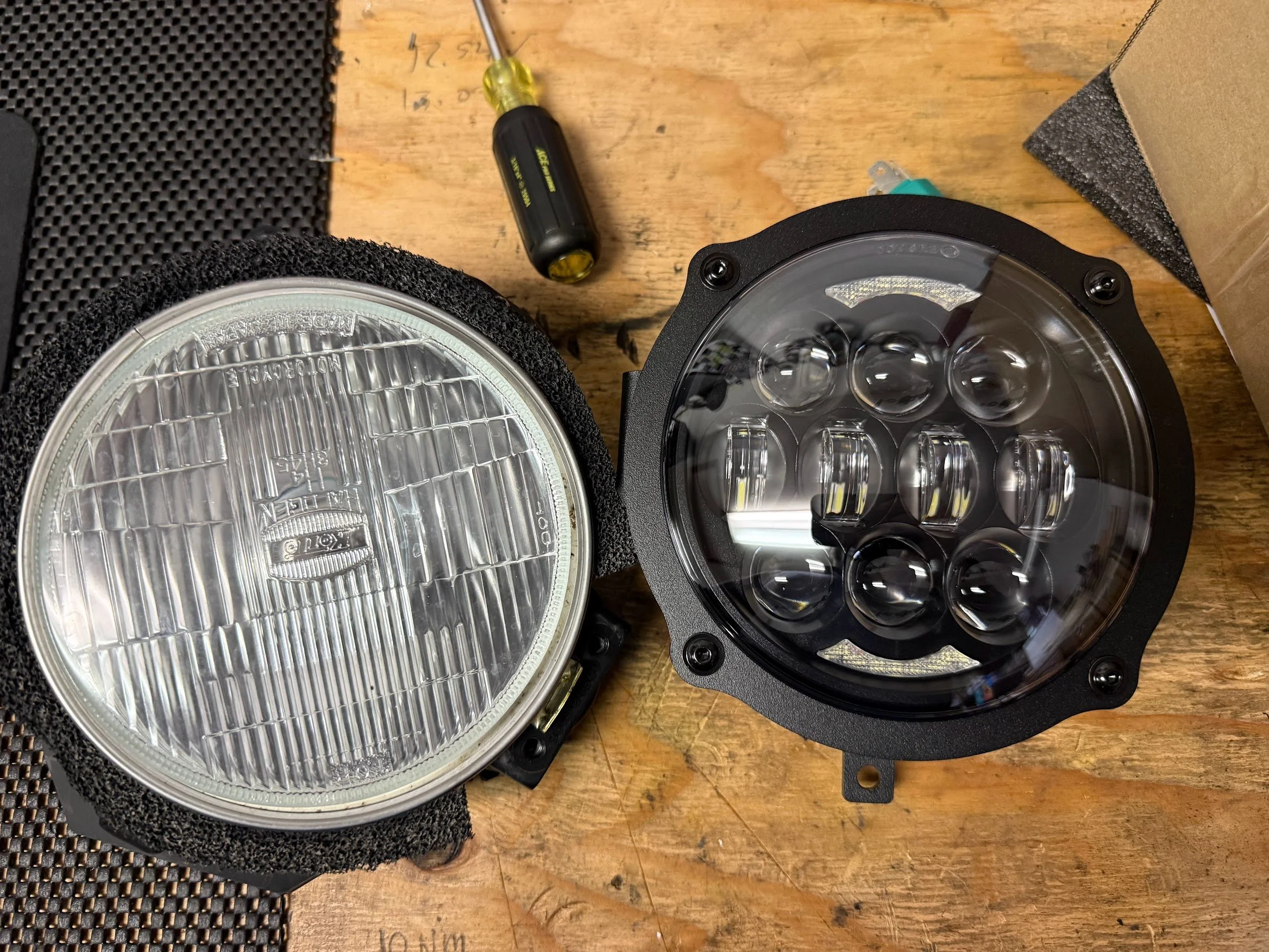 Comparing the OEM light with the new LED light - a way better look. This is a JNS light (linked)