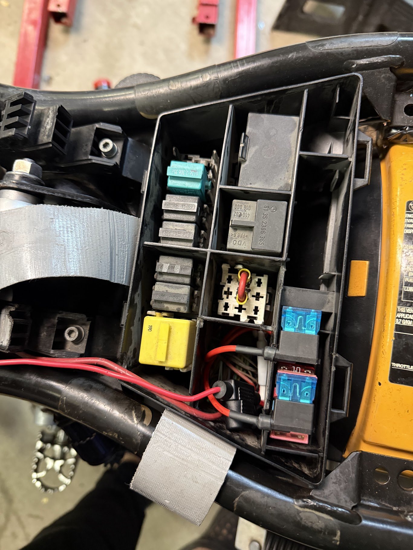 After reviewing the load capacity, I was able to get everything on switched, fused power. It performs well and still does. 