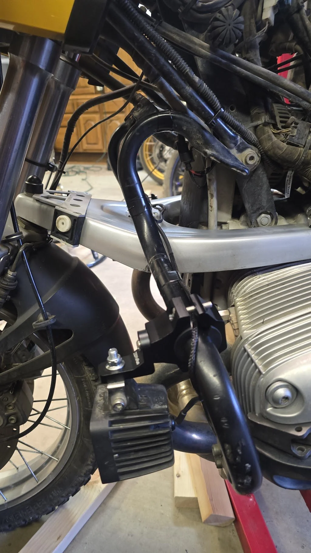 It looks great! Clean. It works. I would later have to rebuild the entire wiring harness for the aux lights a few weeks later when shorts started to manifest themselves. 