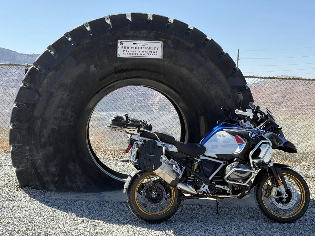 Is that a large enough tire to suit you? A 2020 BMW R1250 GSA adventure in perspective to huge dump truck tire at Santa Rita Copper Mine (New Mexico). Dump truck tires are engineered to withstand extreme heats.