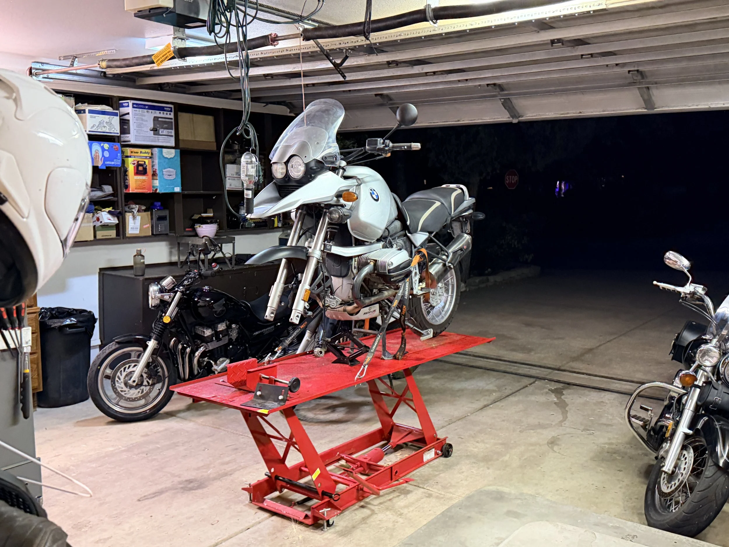 The bike goes on the lift for inspection & planning.
