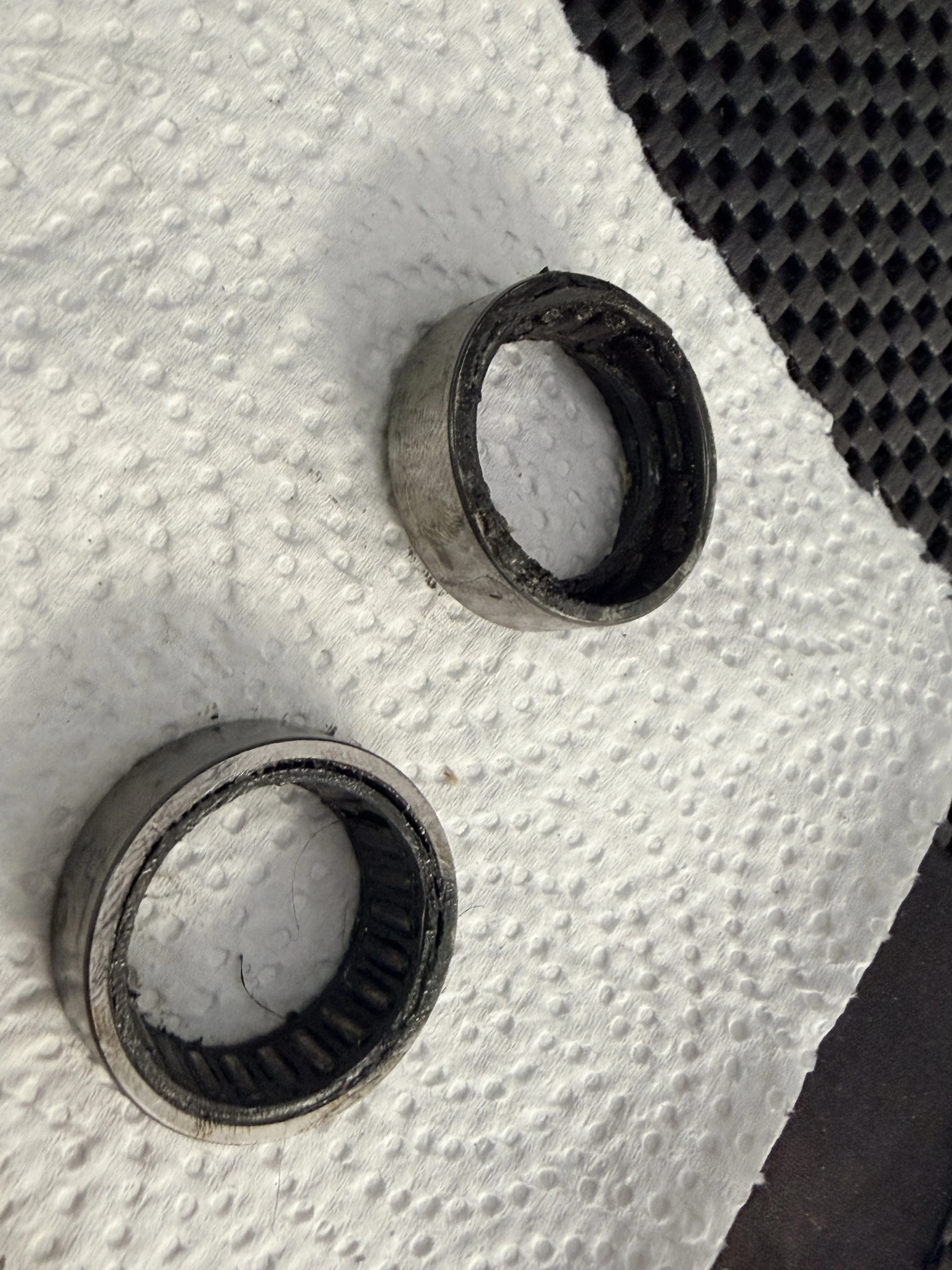 The tapered roller bearings were non-existent. The small bearings fell out of the final drive and were playing ping pong in there. It was at this moment, I became very frustrated. Replaced with Nushing bearings. Super easy to install. 