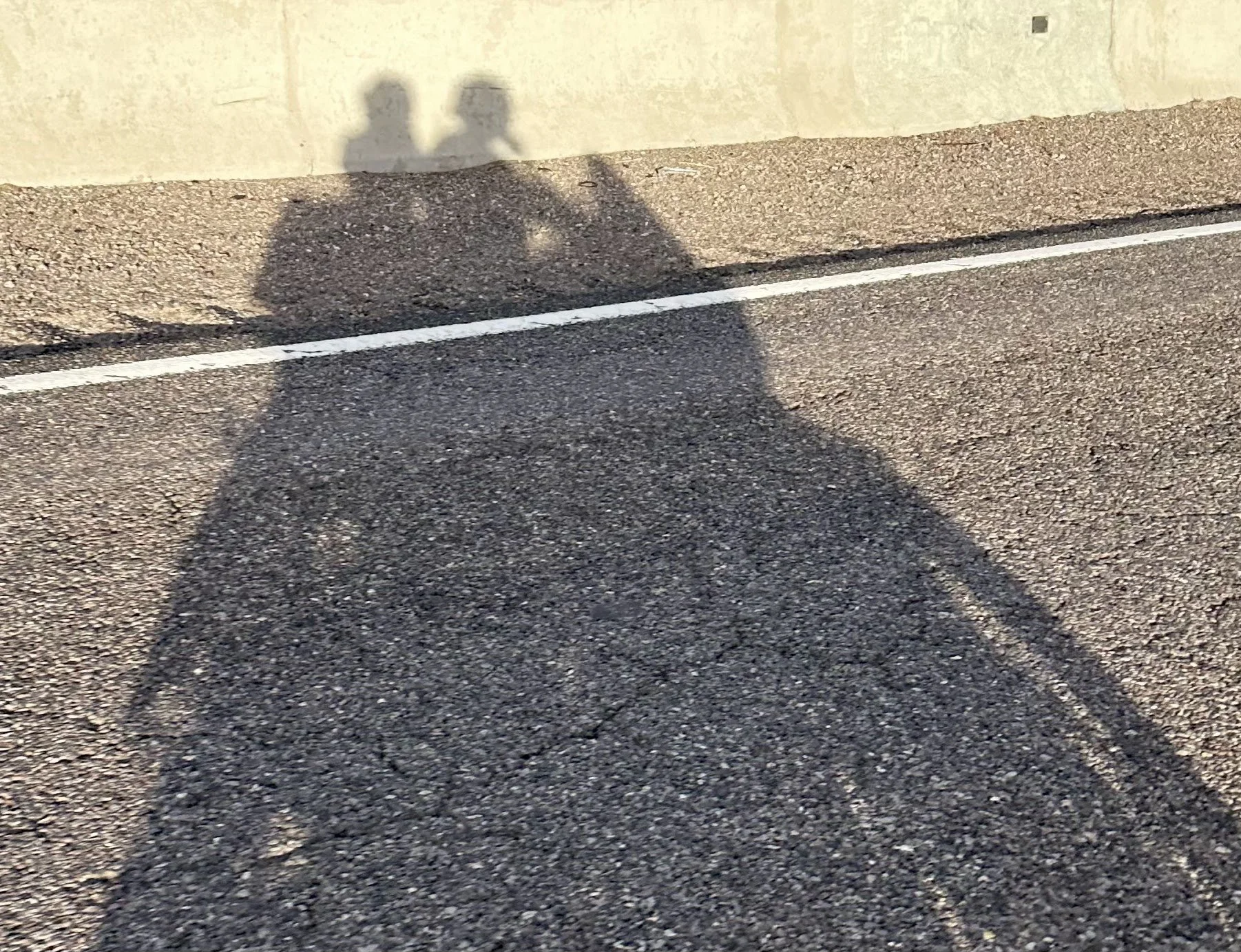 Riding 2UP towards Hatch, NM to round out the day. The sun cast a long shadow. 