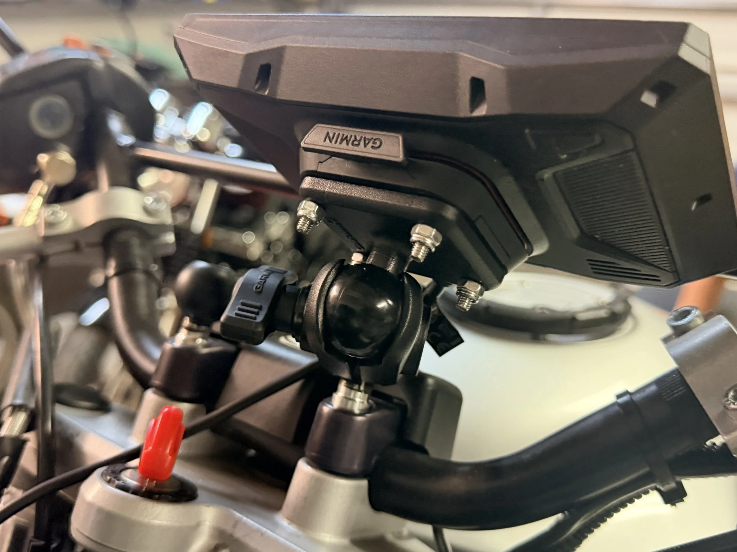 Installed 1" ball mounts, getting all the electronics off the handlebars for a much cleaner look. 