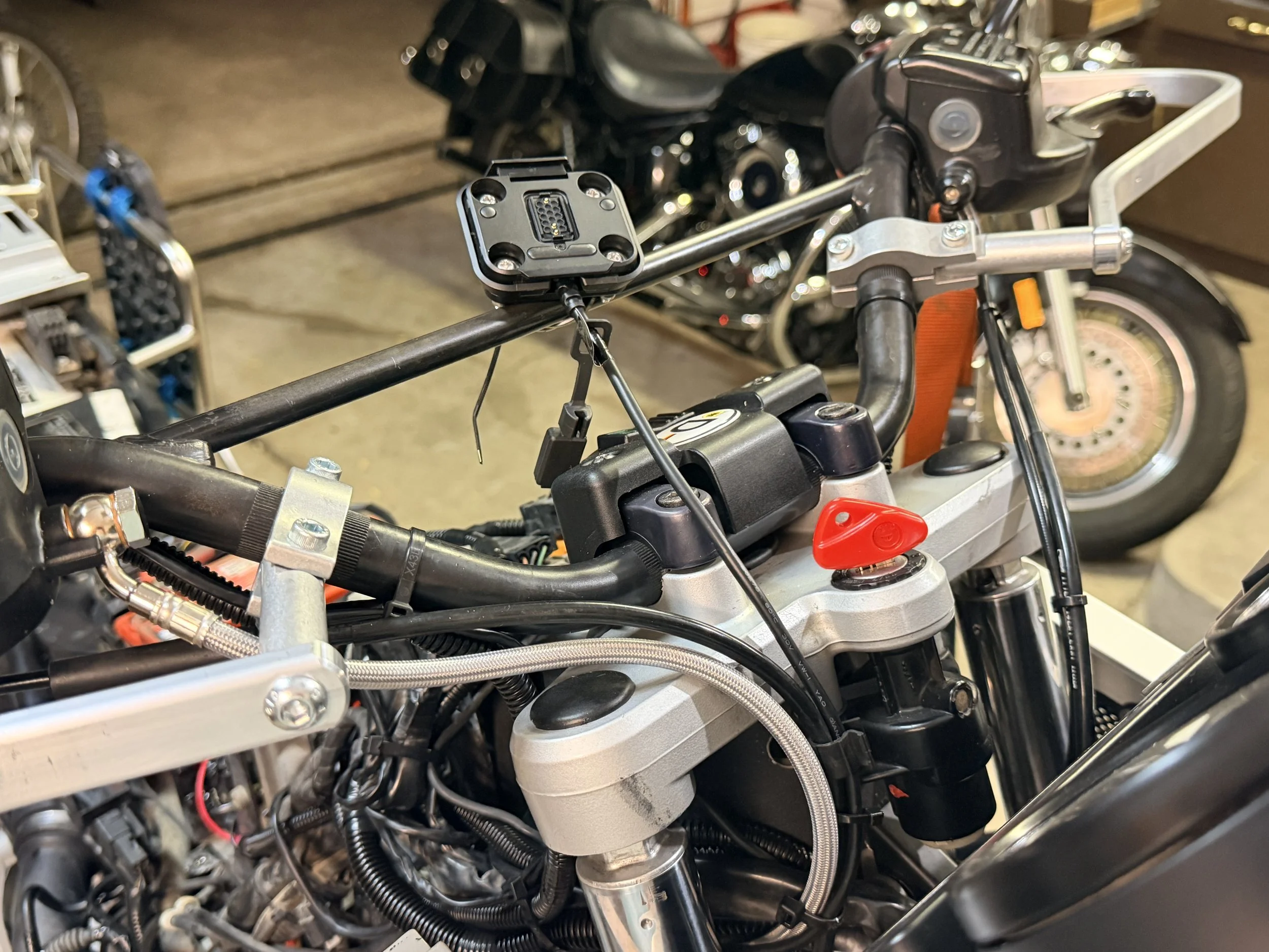 I installed barkbuster handguards. I recognize that the brushguards do brushguard things - I don't need brushguards - just expensive clutch & brake lever protectors. Not having the brushguard gives much better wind up the sleeve for the hot arizona s
