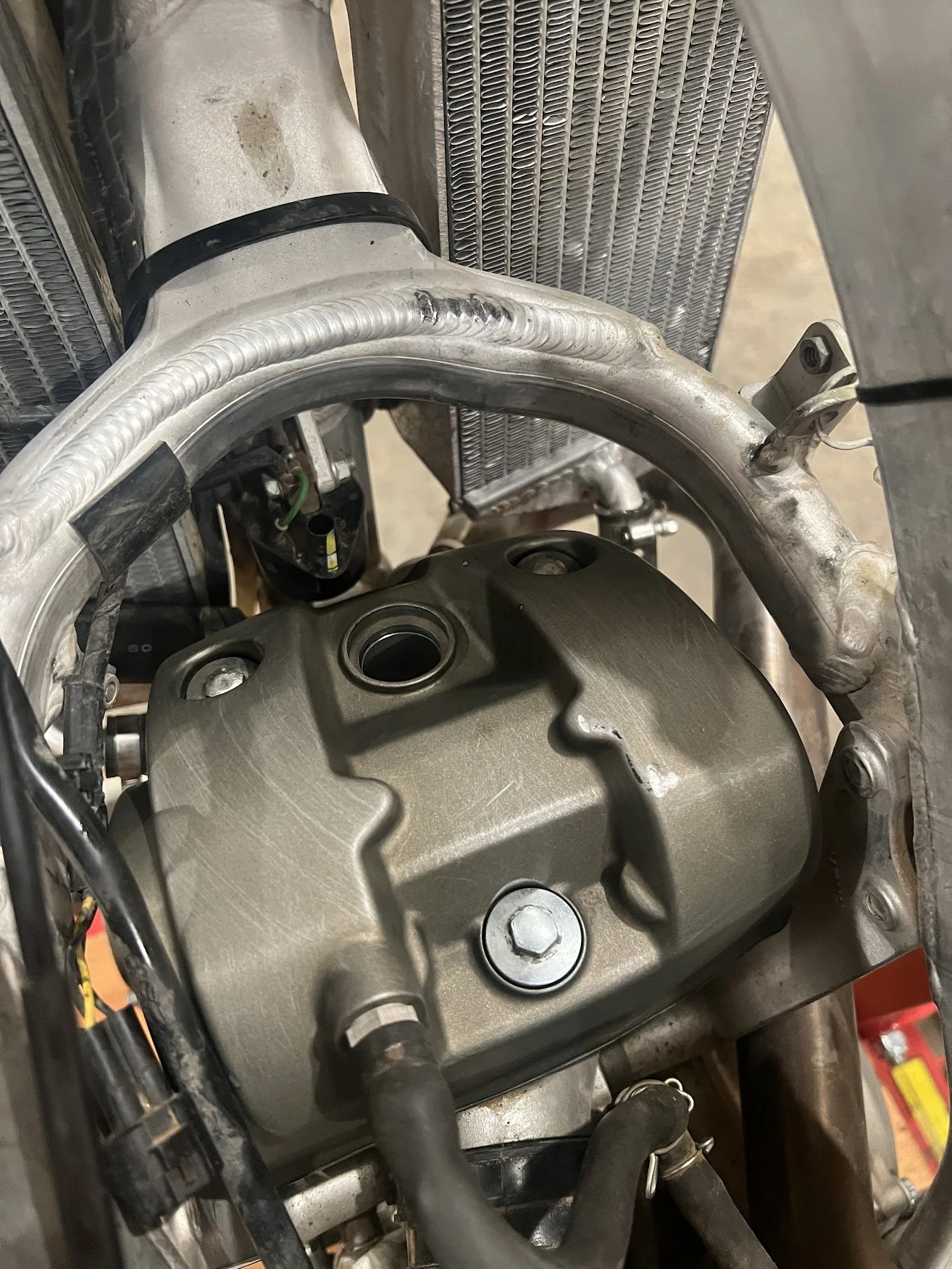 Valves are done, got the top end cleaned up, and the valve cover reinstalled after some heavy elbow grease. 