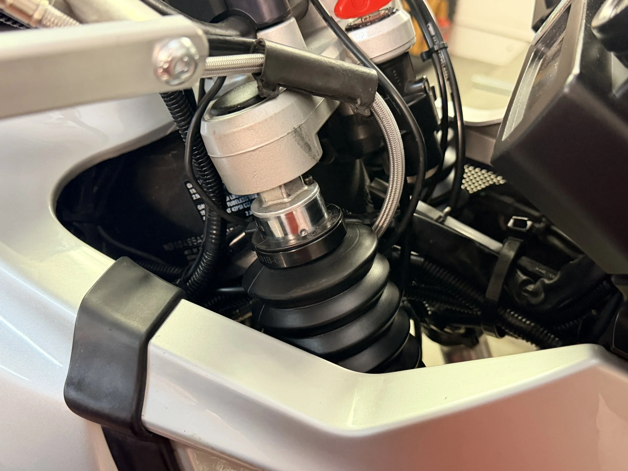 For boots went on - the dust covers kept riding up (as they often do with the aftermarket seal & wiper kits. So I put fork boots on there to protect the seals long-term. 
