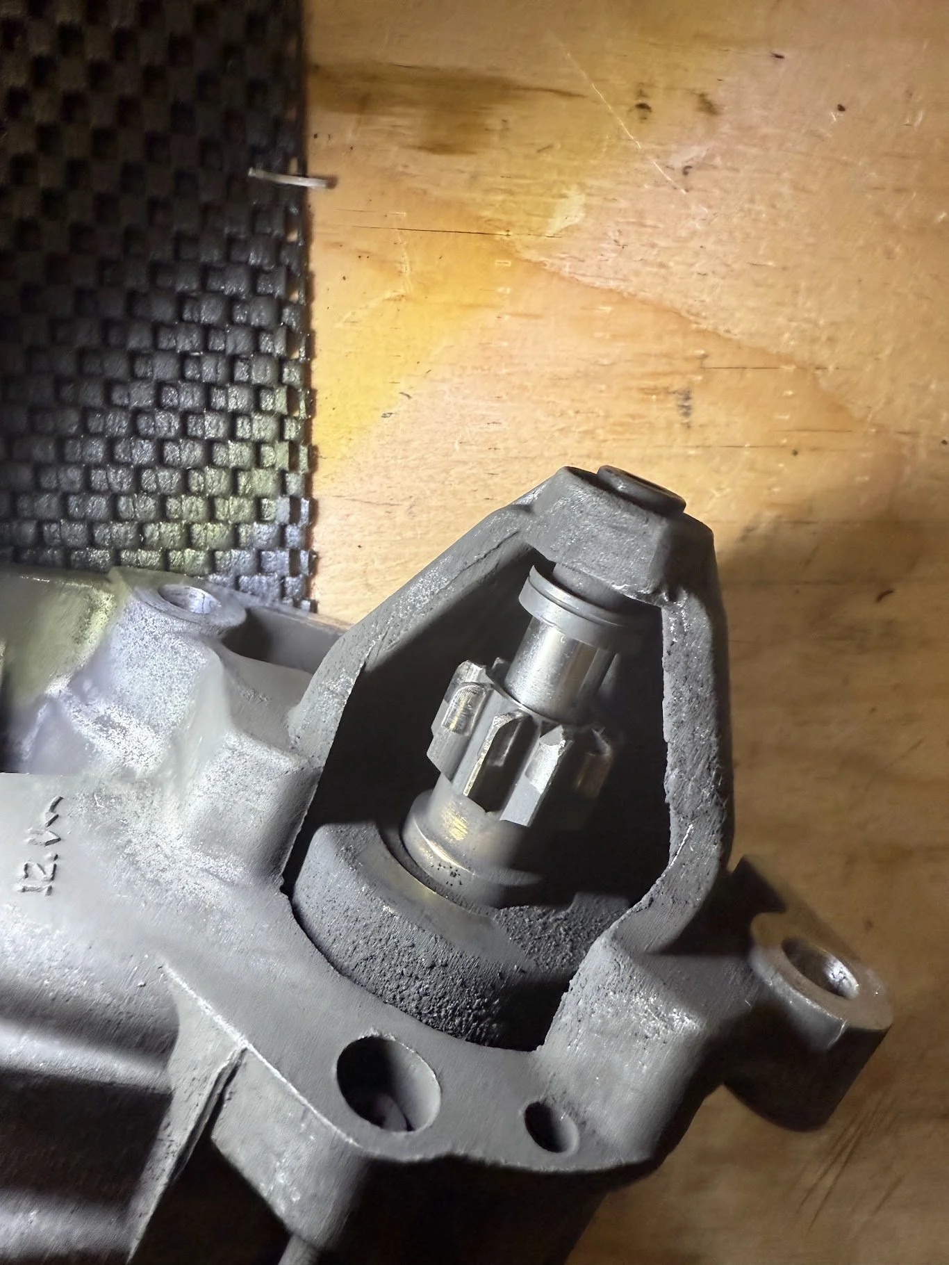The starter motor was making bad noises. It was still doing starter things, but not great. It needed replaced. A rebuild wouldn't do. See stripped teeth. 