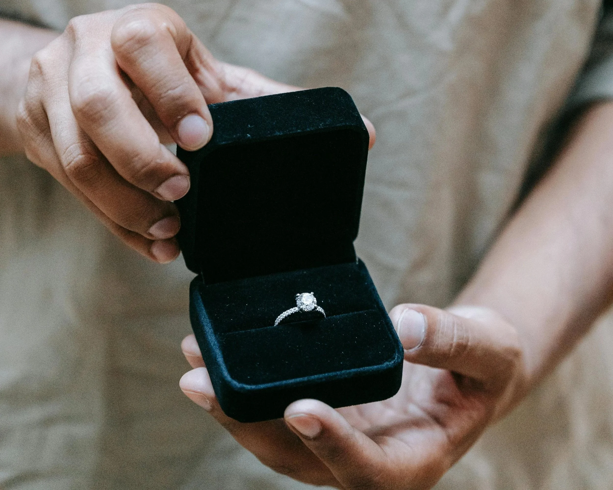 Holding out ring symbolizing premarital workshops building a lasting connection michal goldman lcsw