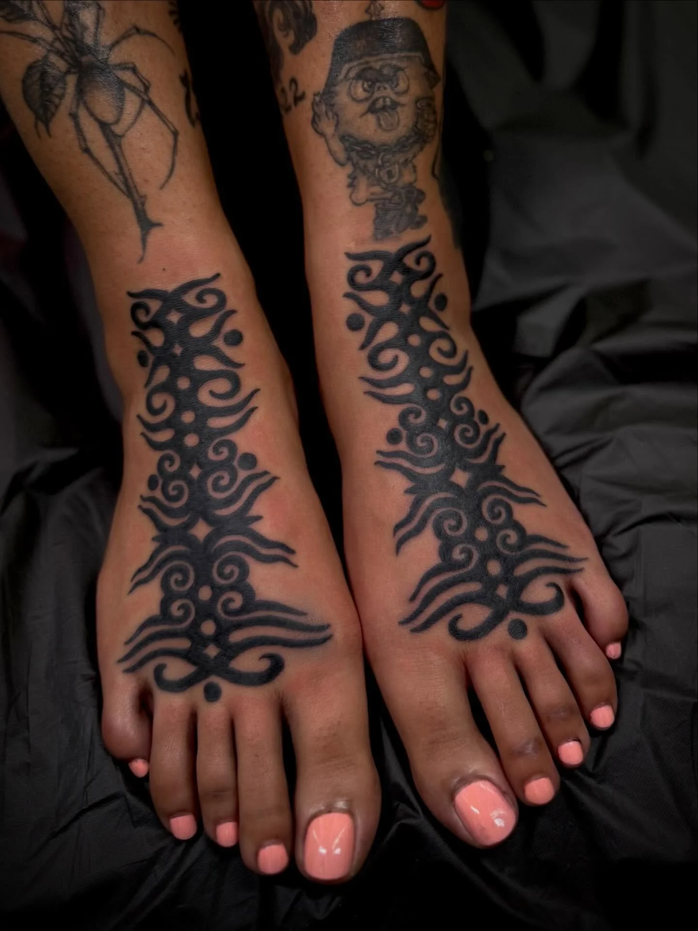 Symmetrical Tribal for the feet of my love @m0nsvenus done in 1 hour. Visit the link in bio to secure your spot. @elmstreettattoo #traditionaltattoo #americantraditional #tattooart #tattooartist #tattoos