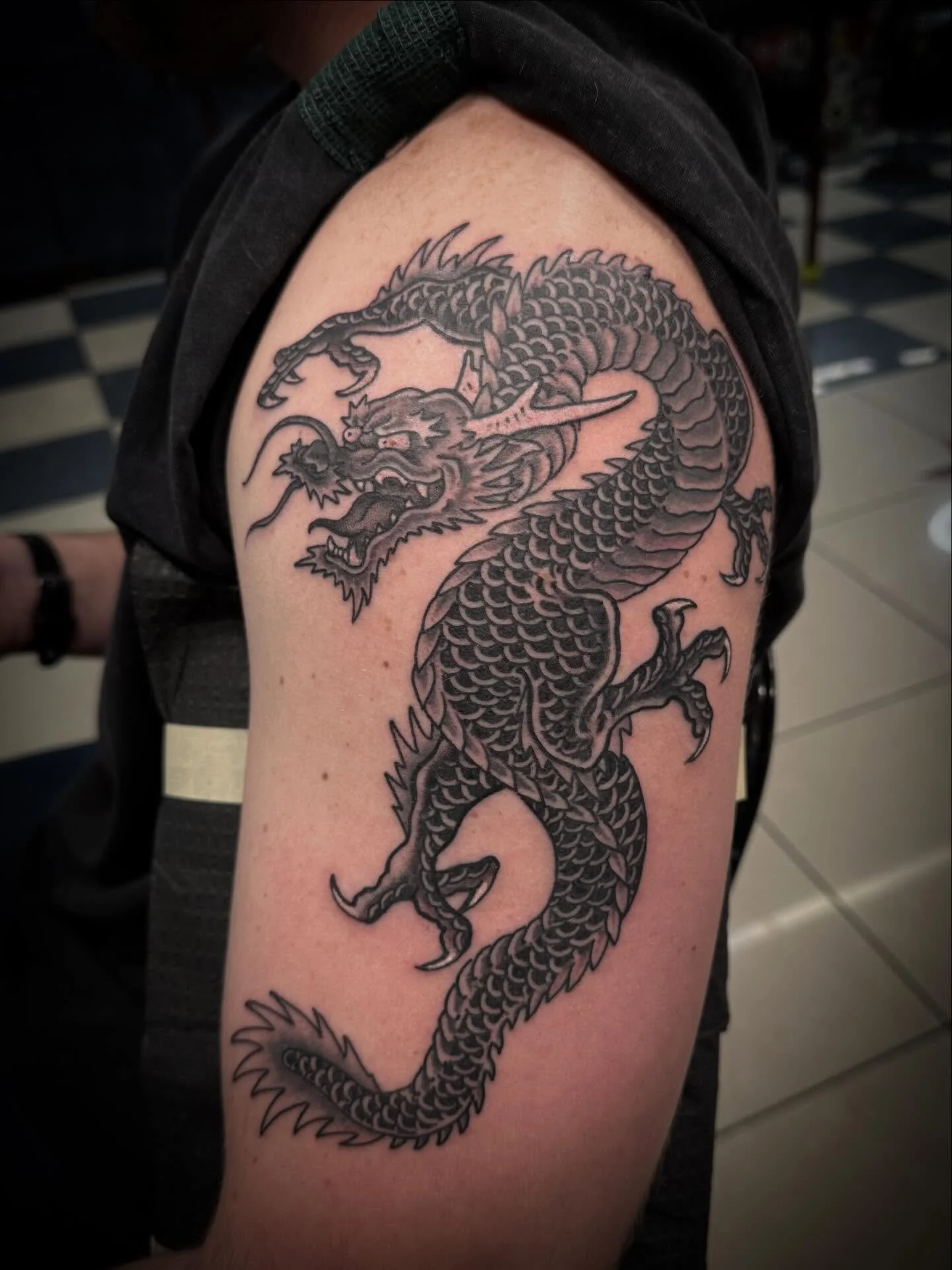 Dragon done @elmstreettattoo #traditionaltattoo #americantraditional #tattooart #tattooartist #tattoos DM with questions or LINK IN BIO FOR APPOINTMENTS.