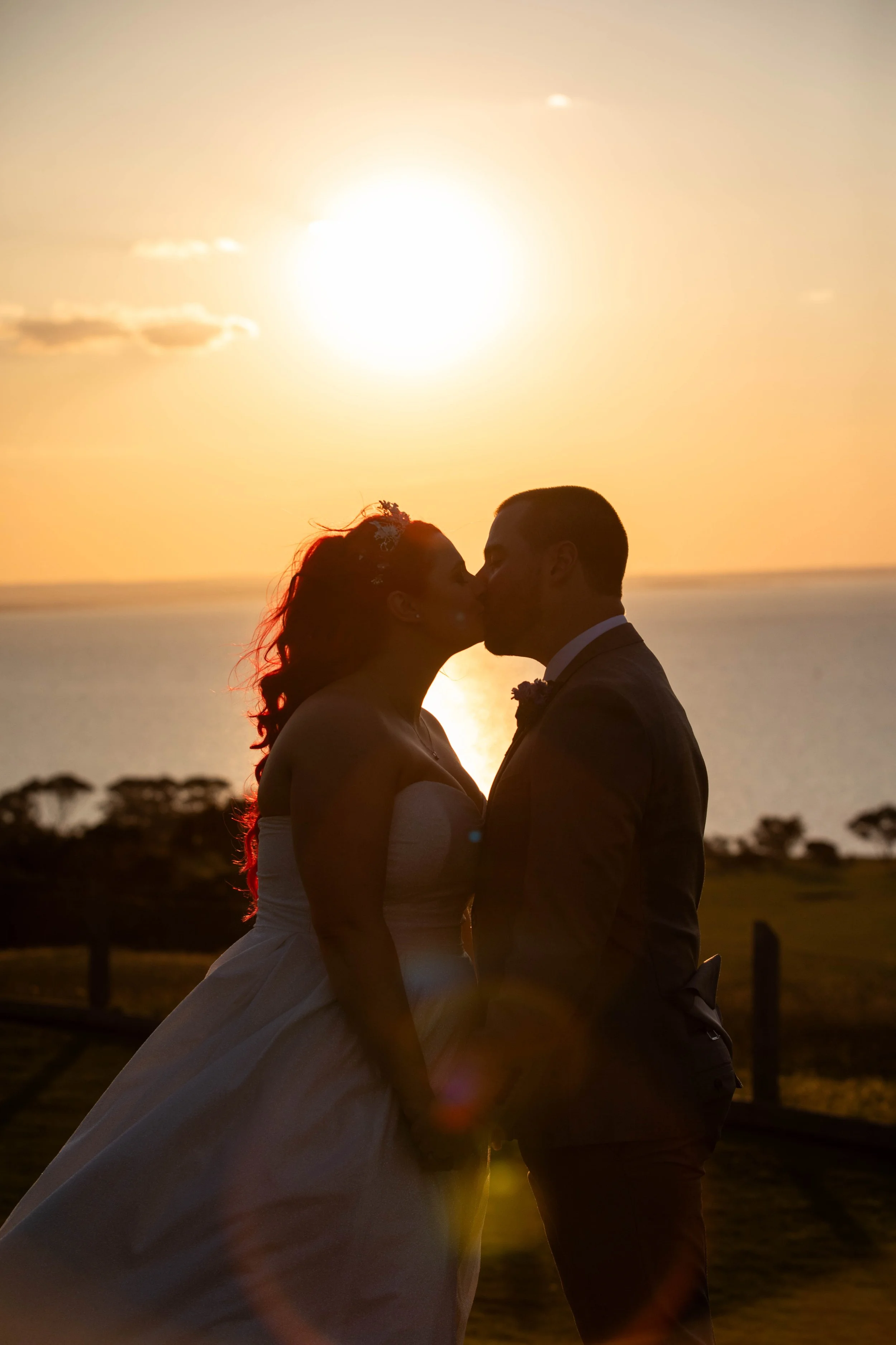 Chelsea & Garry's wedding photos shoot near sunset at Jack Rabbit Winery in Bellarine