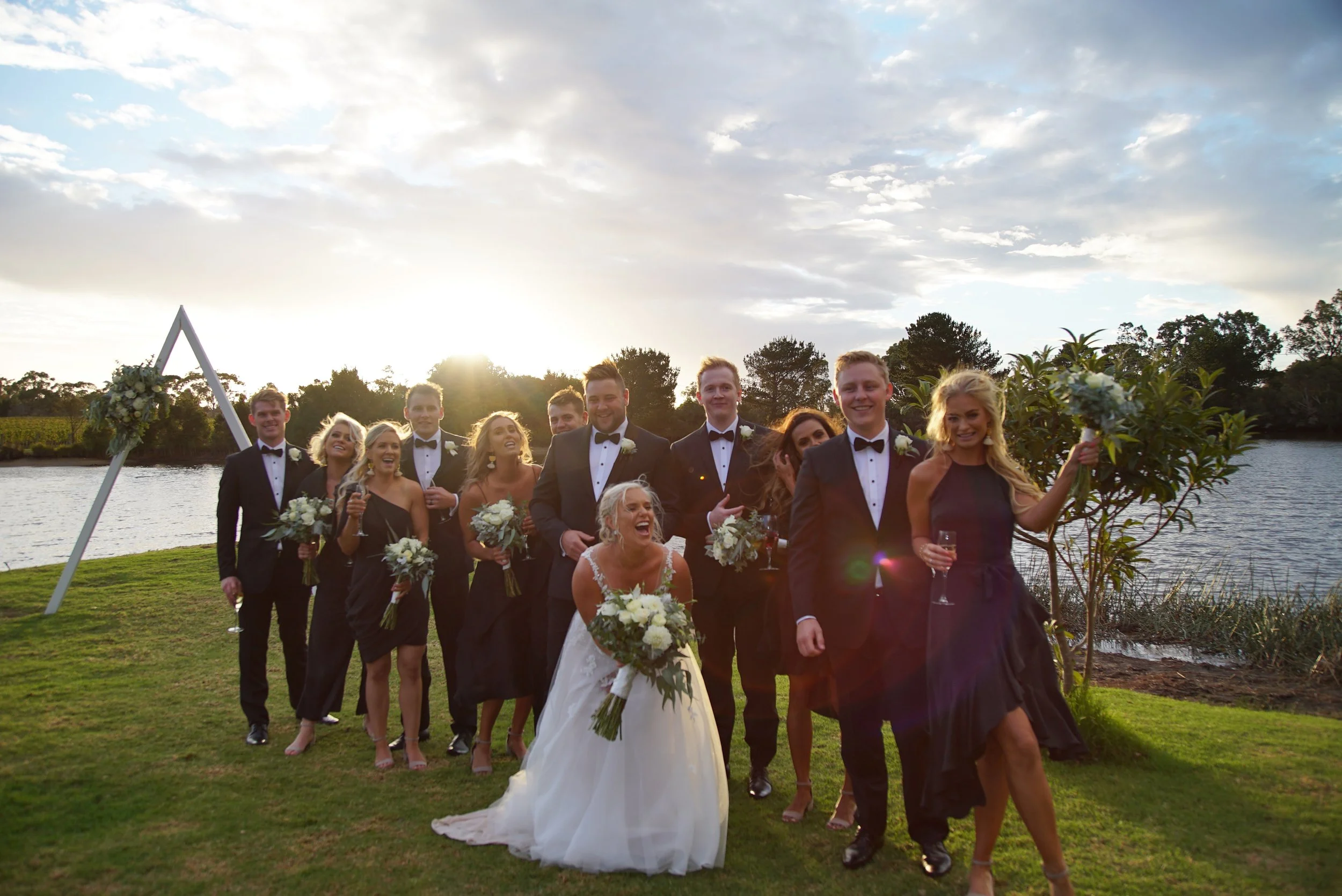 Sophia & Trevor's wedding having fun during their photo shoot at Crittenden Estate