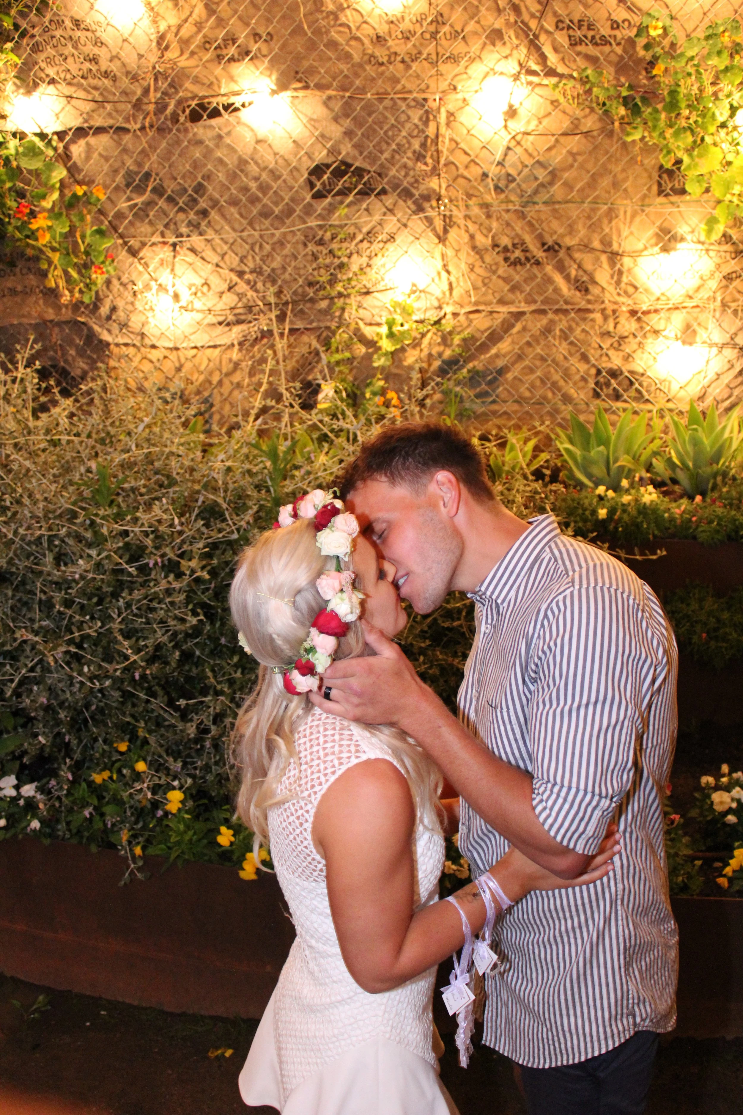 Steff & Dean's Wedding at Common Folk in Mornington sharing their first kiss