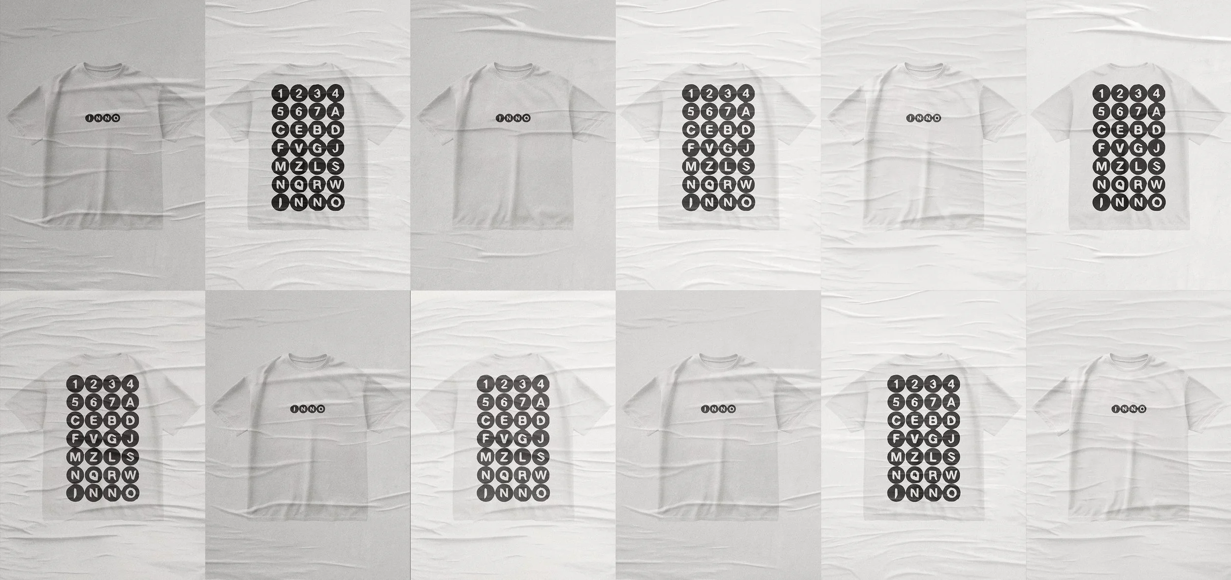 A grid of white T-shirts with black circular graphics. Some shirts have the word 'ONO' printed, and others have a grid of circles with numbers and letters inside.