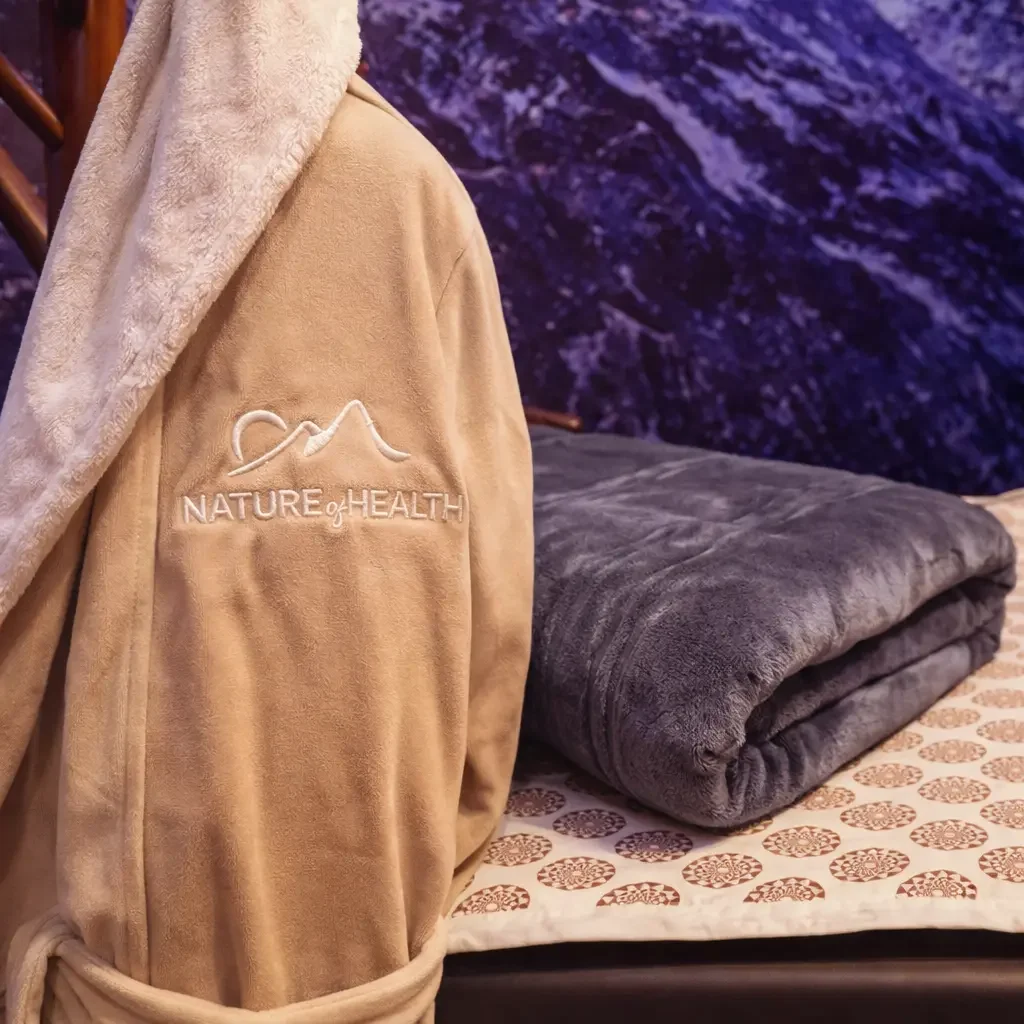 Plush towels and robes provided at The Nature of Health wellness clinic in Gilbert, AZ