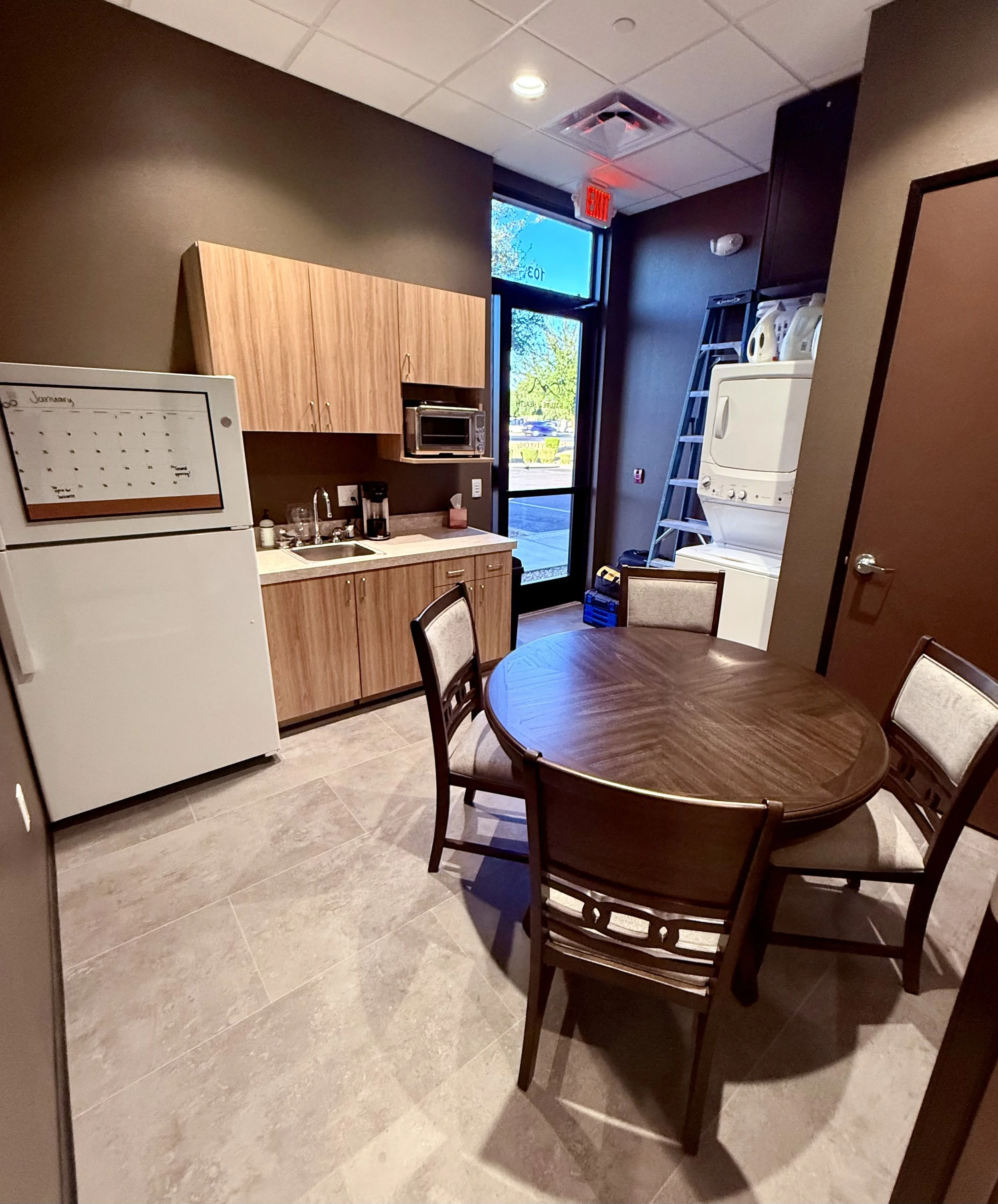 The Den employee kitchen and lounge at The Nature of Health in Gilbert, AZ