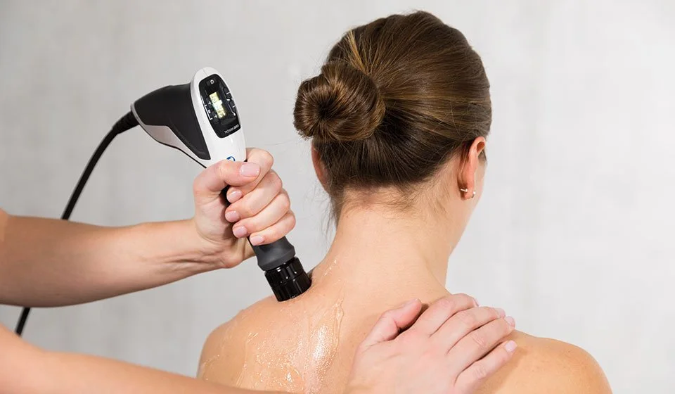 Acoustic shockwave therapy treatment for muscle and tendon pain at The Nature of Health in Gilbert, AZ