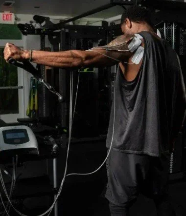 Neubie therapy using neuro-bio-electric stimulation applied to shoulder muscles at The Nature of Health in Gilbert, AZ