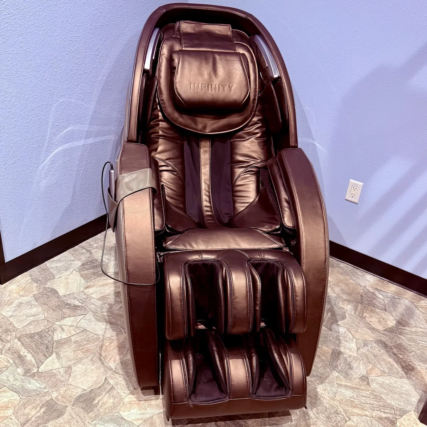 Zero-gravity massage chair therapy at The Nature of Health wellness spa in Gilbert, AZ