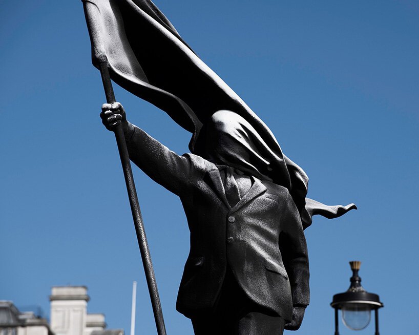 The Suited Void: Banksy’s Waterloo Place Statue and the Architecture of Legible Blindness