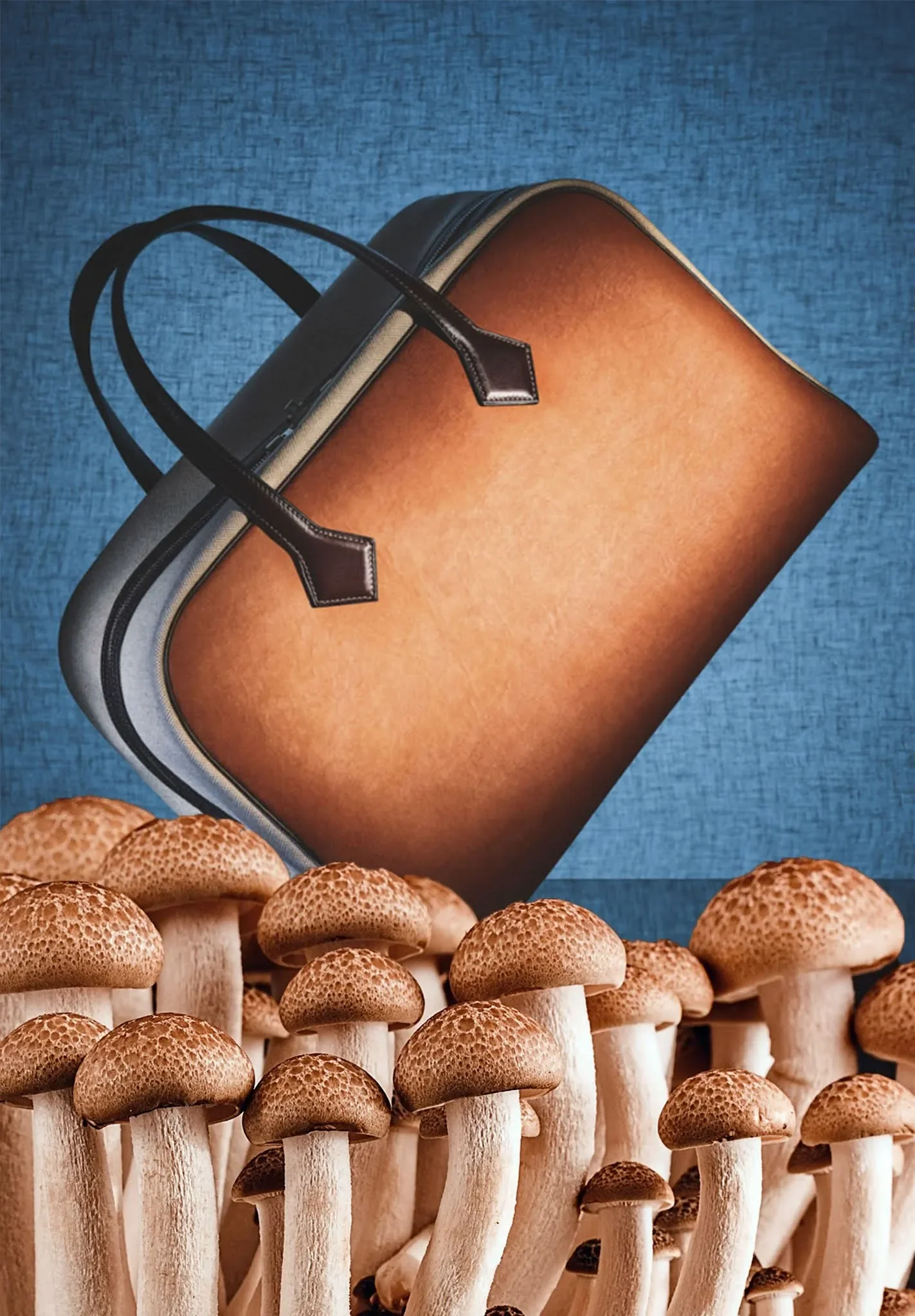 A conceptual image showing the Hermès Victoria bag in amber-hued Sylvania material suspended above a cluster of wild brown mushrooms to illustrate the intersection of biotechnology and luxury craft.