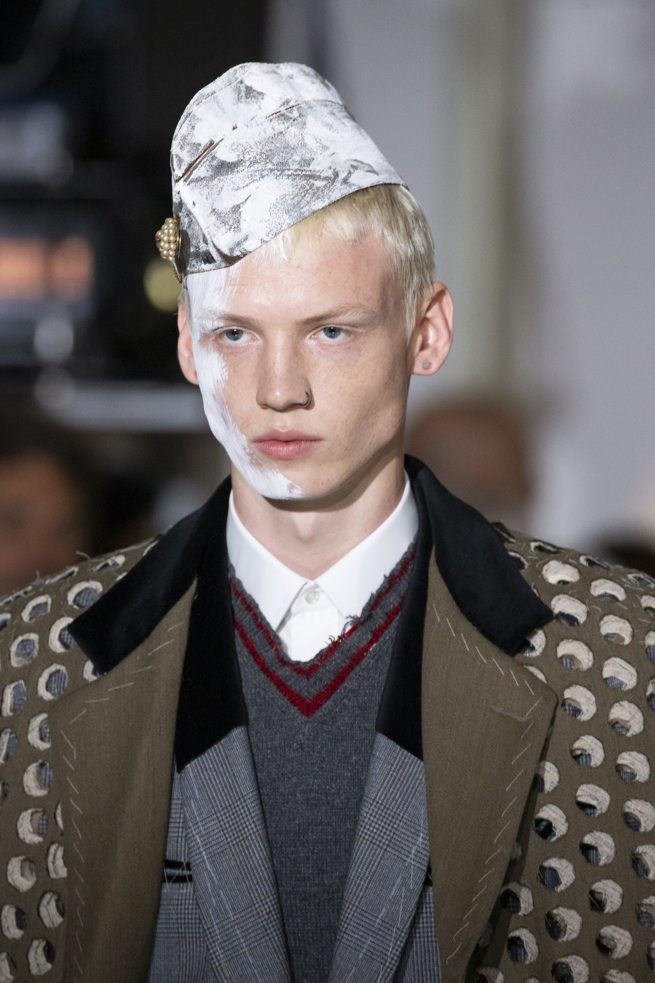 A full-length look from the Fall 2019 Artisanal collection featuring the Bianchetto white overpaint technique, showcasing the cracking textures and the deliberate concealment of the garment's original materiality.