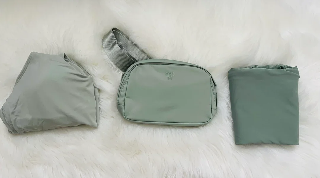 A side-by-side comparison of a mint green belt bag dupe and two folded garments in similar colors, demonstrating aesthetic replication across brands.
