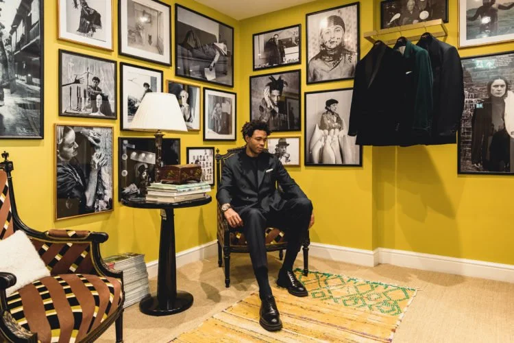 Charlie Casely Hayford sitting in his atelier