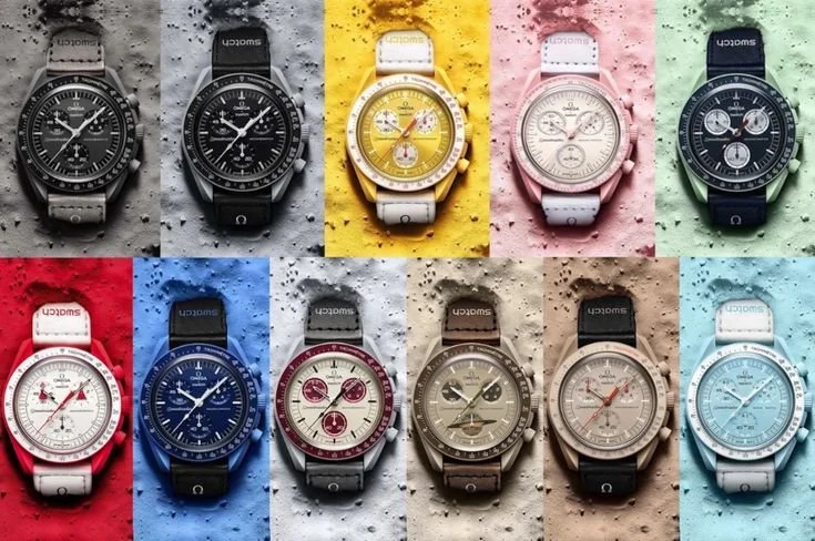 A grid of eleven colorful Omega x Swatch MoonSwatch watches, each representing a different celestial body, displayed against textured, color-coded moon-dust backgrounds.