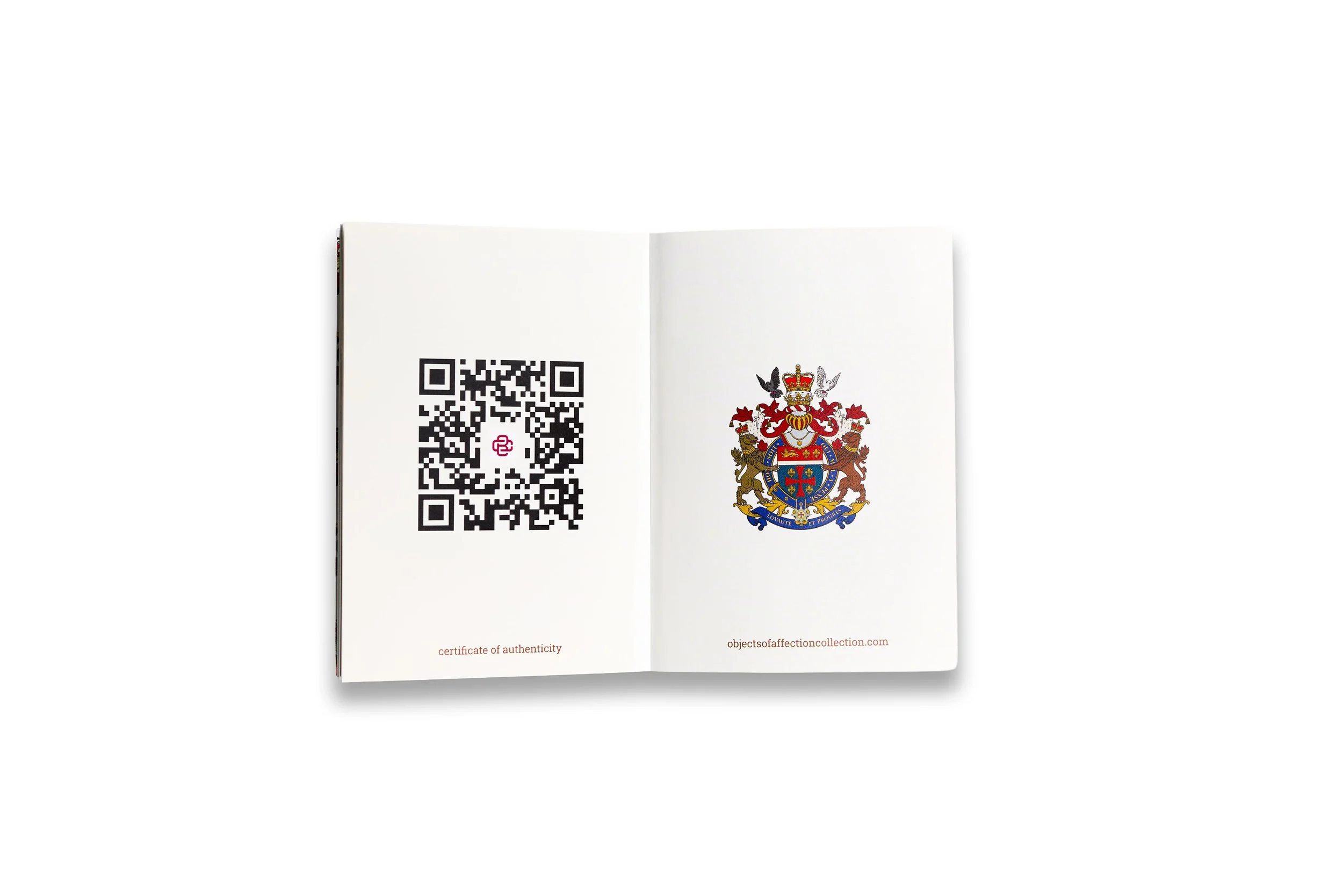 An open physical product book for the Objects of Affection Collection, displaying a digital Certificate of Authenticity with a unique QR code on the left and a detailed heraldic crest on the right.