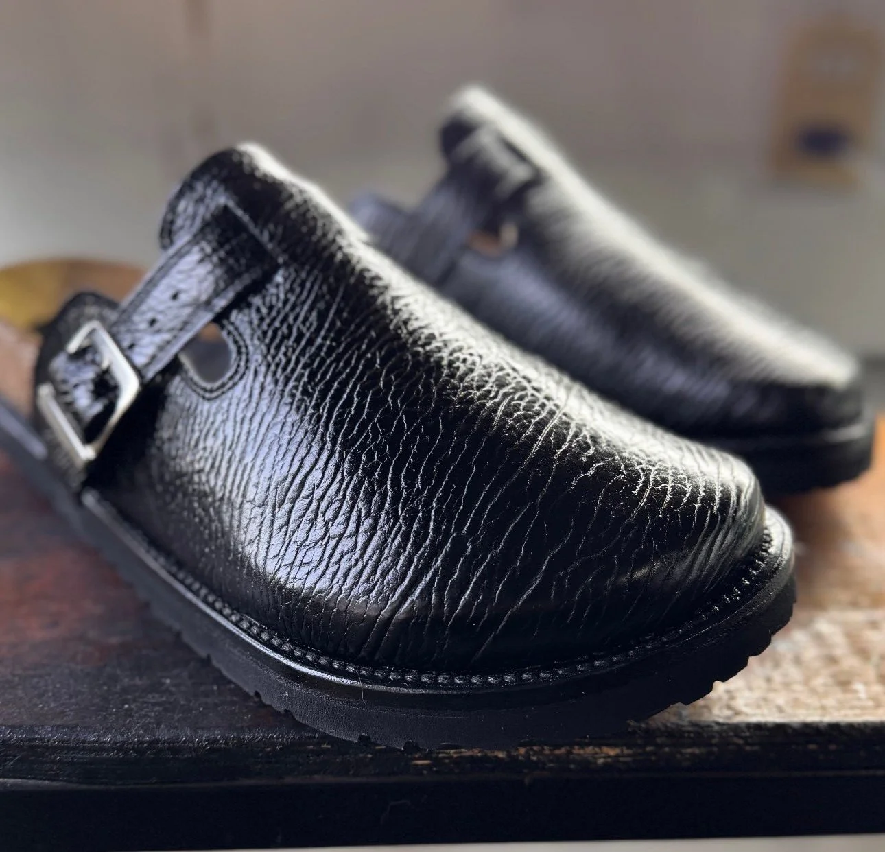 Noir Sand Shark Mule: A Form Defined by Shadow and Texture