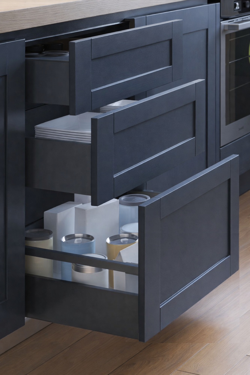 Navy blue shaker drawers in modern kitchen.png
