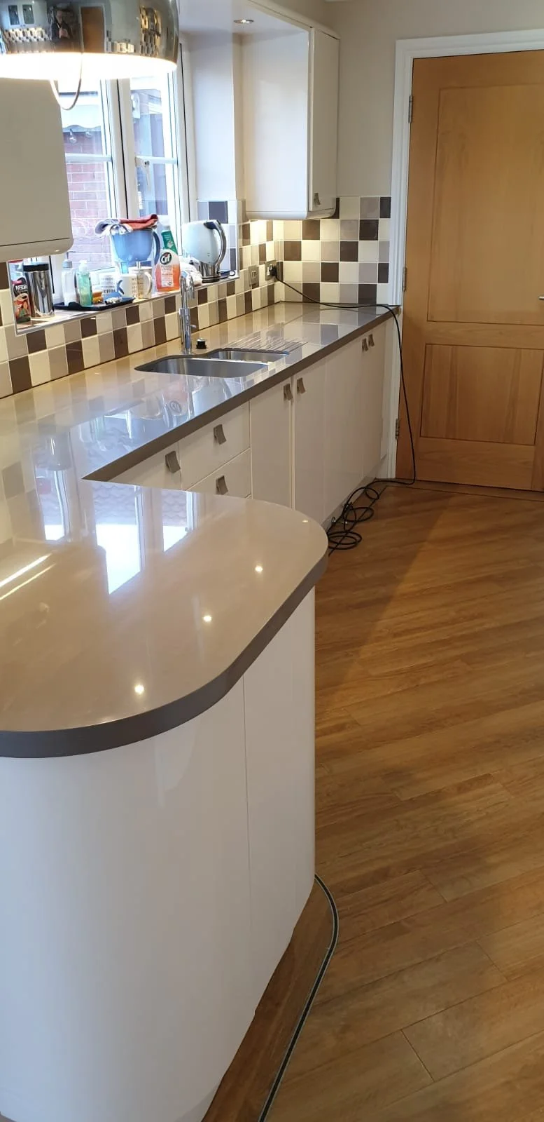 Bespoke Corian worktops designed, manufactured and installed in London. Durable solid surface finish with seamless joints, perfect for modern kitchens and utility spaces.