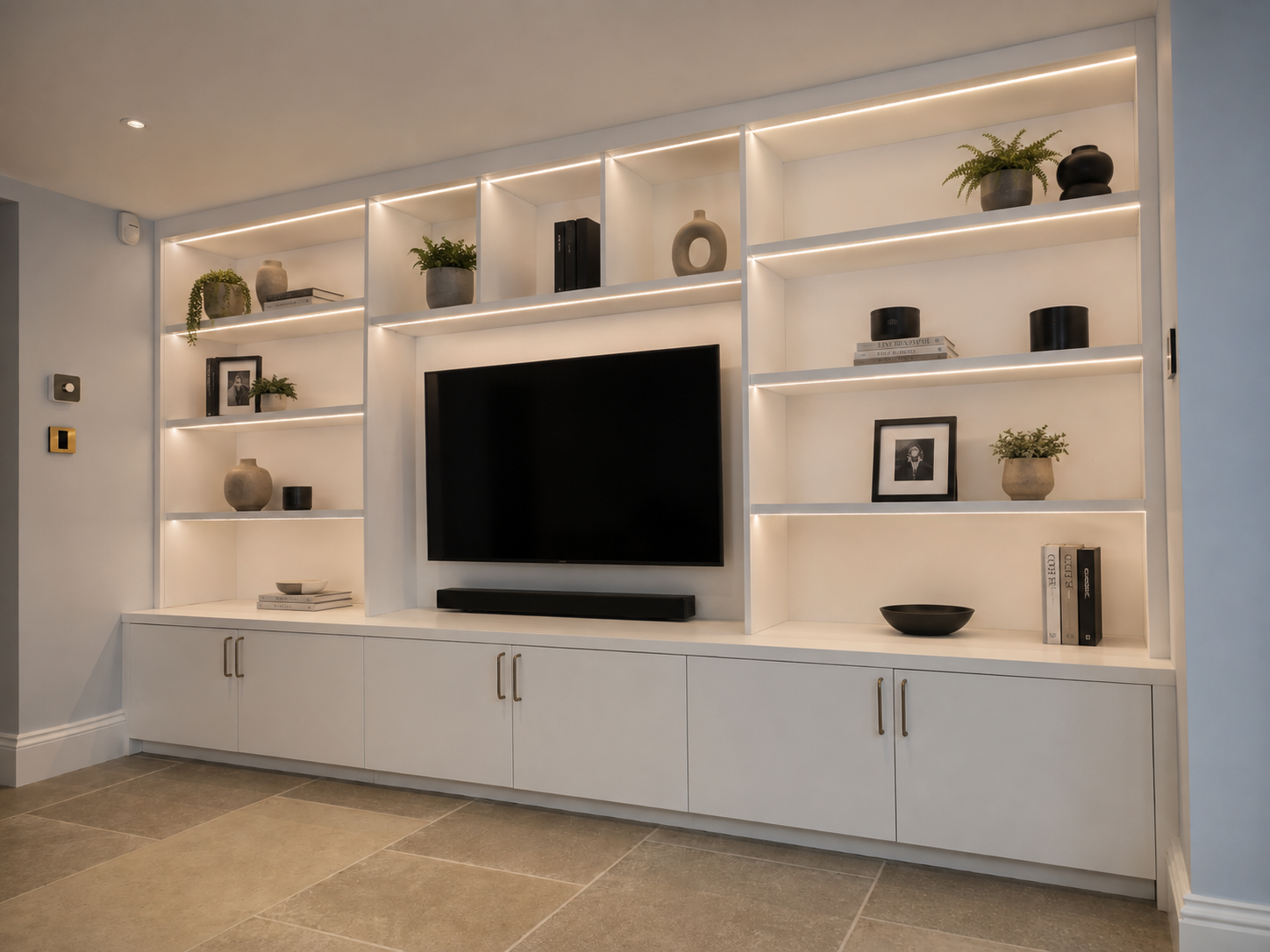 Modern Media Wall with Warm LED Shelving.png
