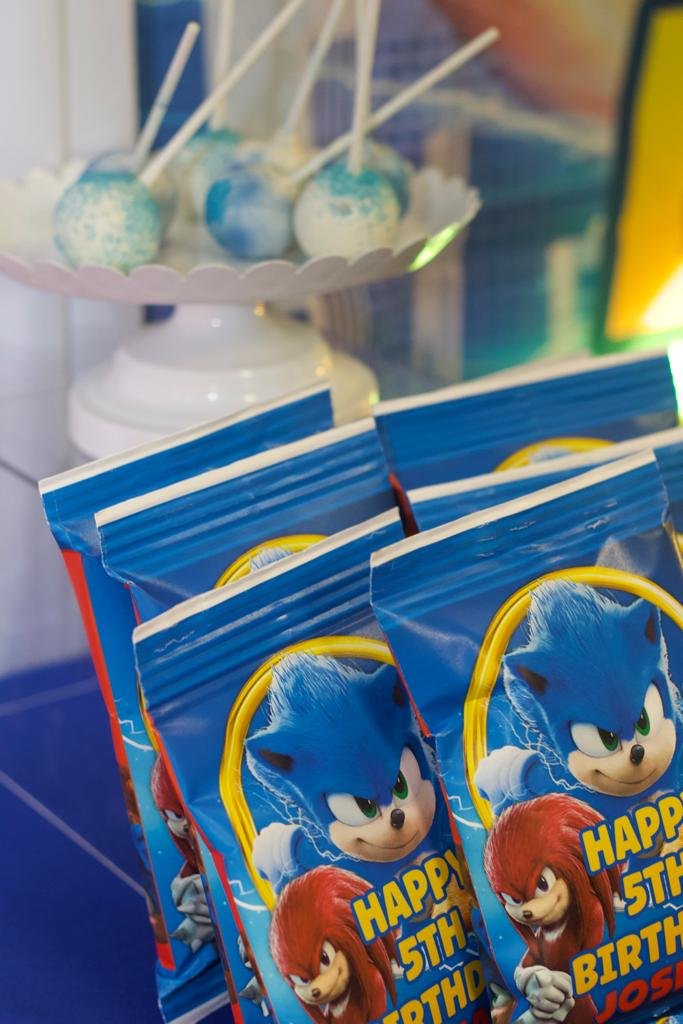 Packet of Sonic and Tails themed birthday party favors with Sonic and Tails characters and birthday message.