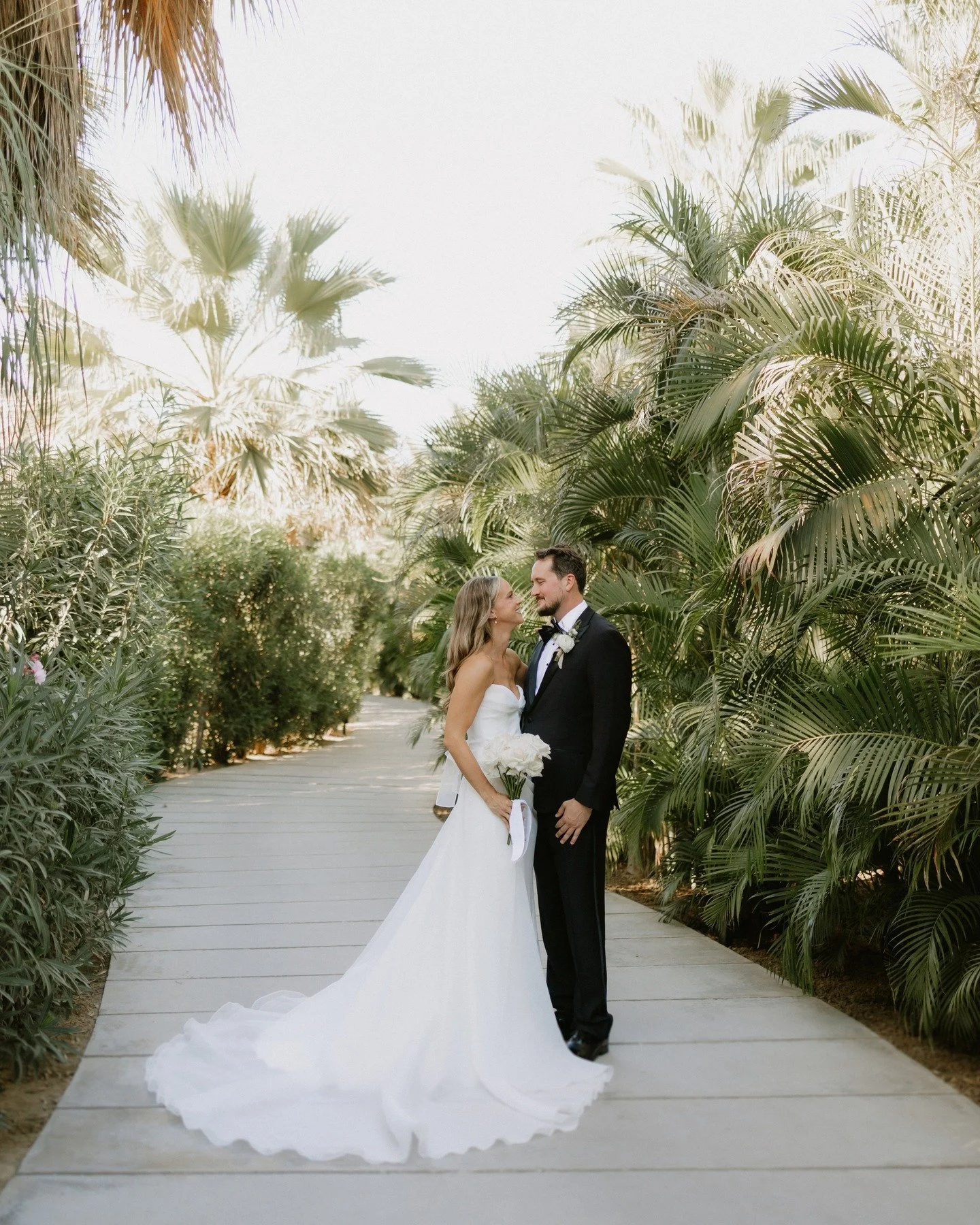 The stunning Katie &amp; Clark at the beautiful @acreresort 

Planning &amp; Styling @loladelcampo @elsa.alvarezalcantara
Stationery &amp; Signage @jemandi_designs
Venue @acre.wedding
Photography @xicogtzphoto

#semicustomwedding #balance #invitation