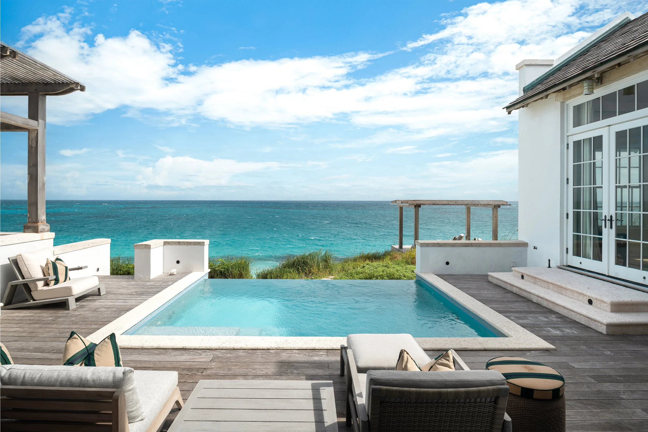 06 - Ambergris-Cay-Osprey-4-bedroom-villa-pool-with-ocean-view-Turks-and-Caicos.jpg