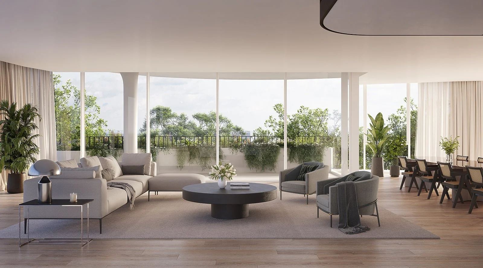 Open-plan living area with soft furnishings, timber flooring, and large glass doors to the courtyard