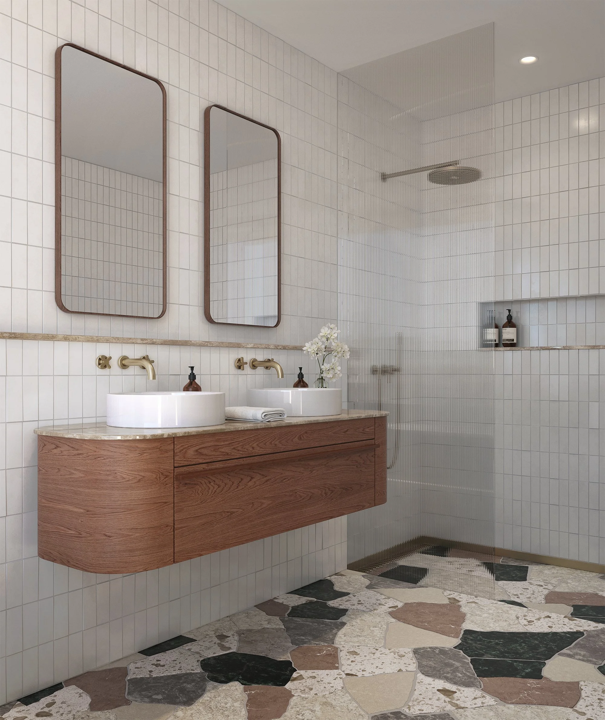 	Hotel bathroom featuring marble finishes, brass fixtures, and ambient lighting