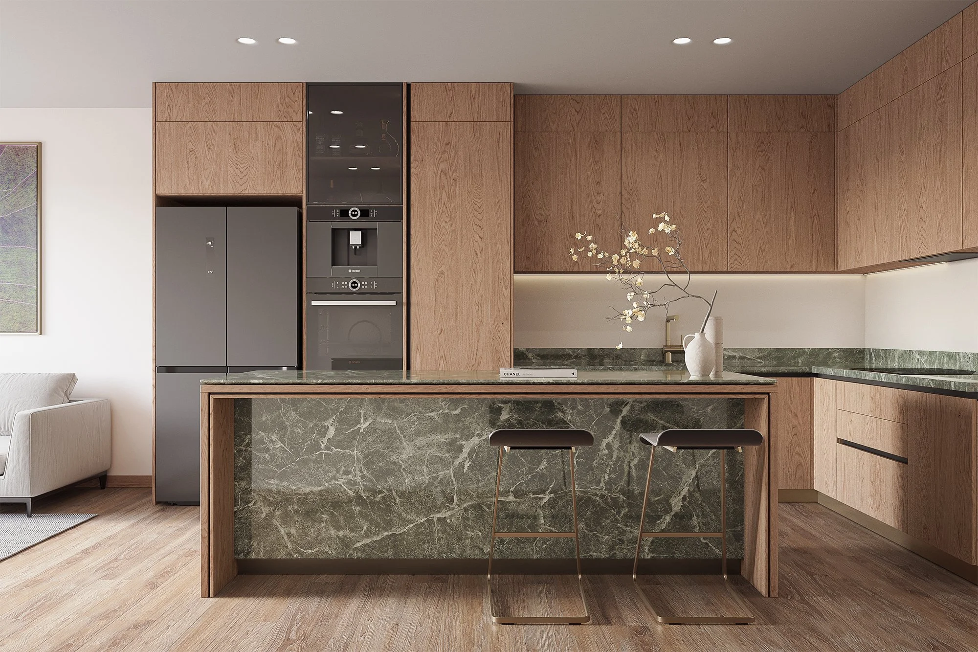 Open hotel kitchen with marble countertops, matte black fixtures, and pendant lights