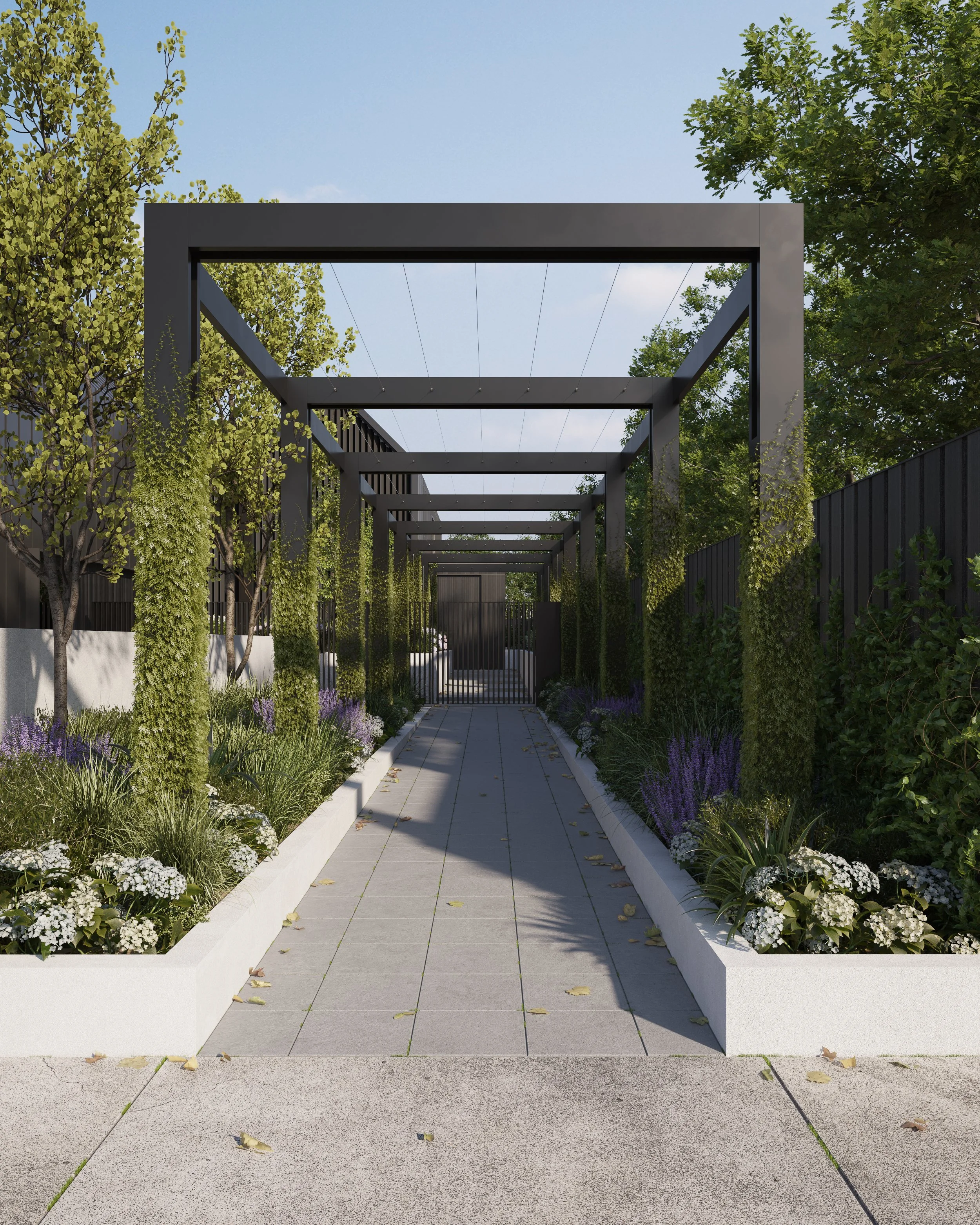 Architectural pergola-covered walkway leading to residential units, surrounded by planting